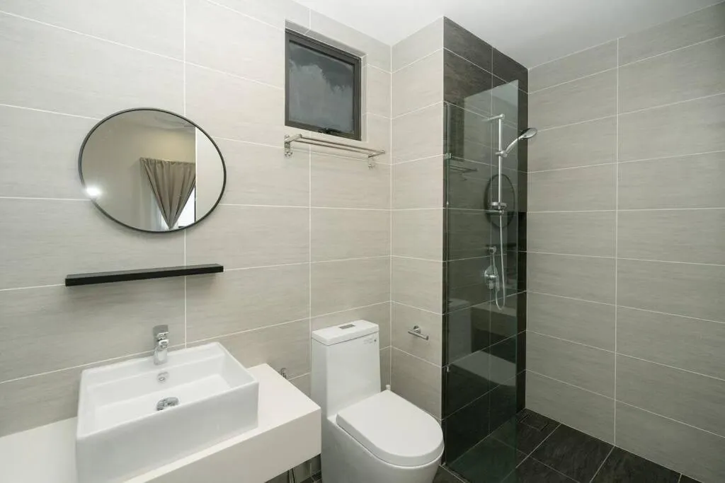 Shower in Cozy Skyline Retreat at Trion KL, Level 63