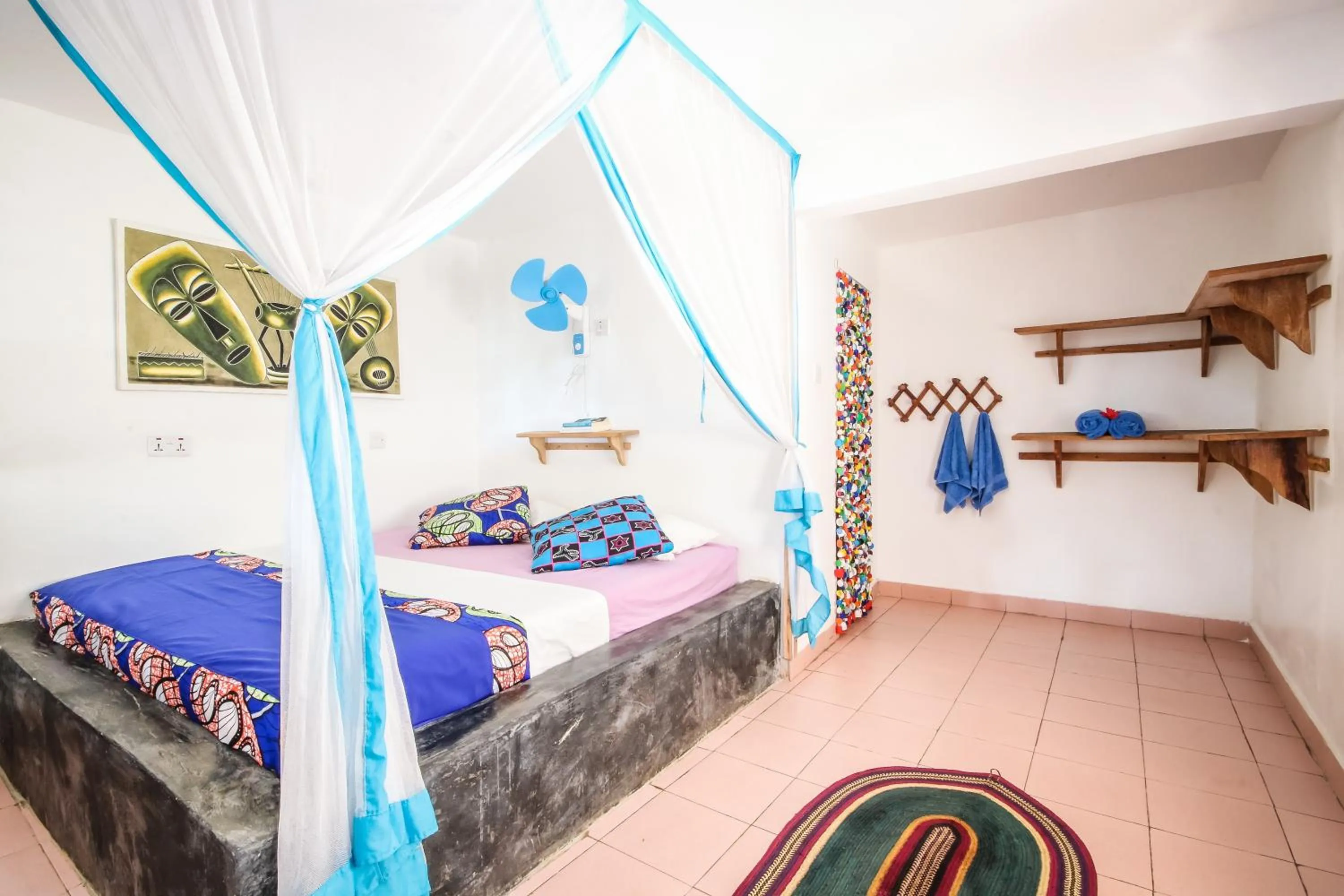 Photo of the whole room, Bed in Blue Reef Sport & Fishing Lodge and Bungalows