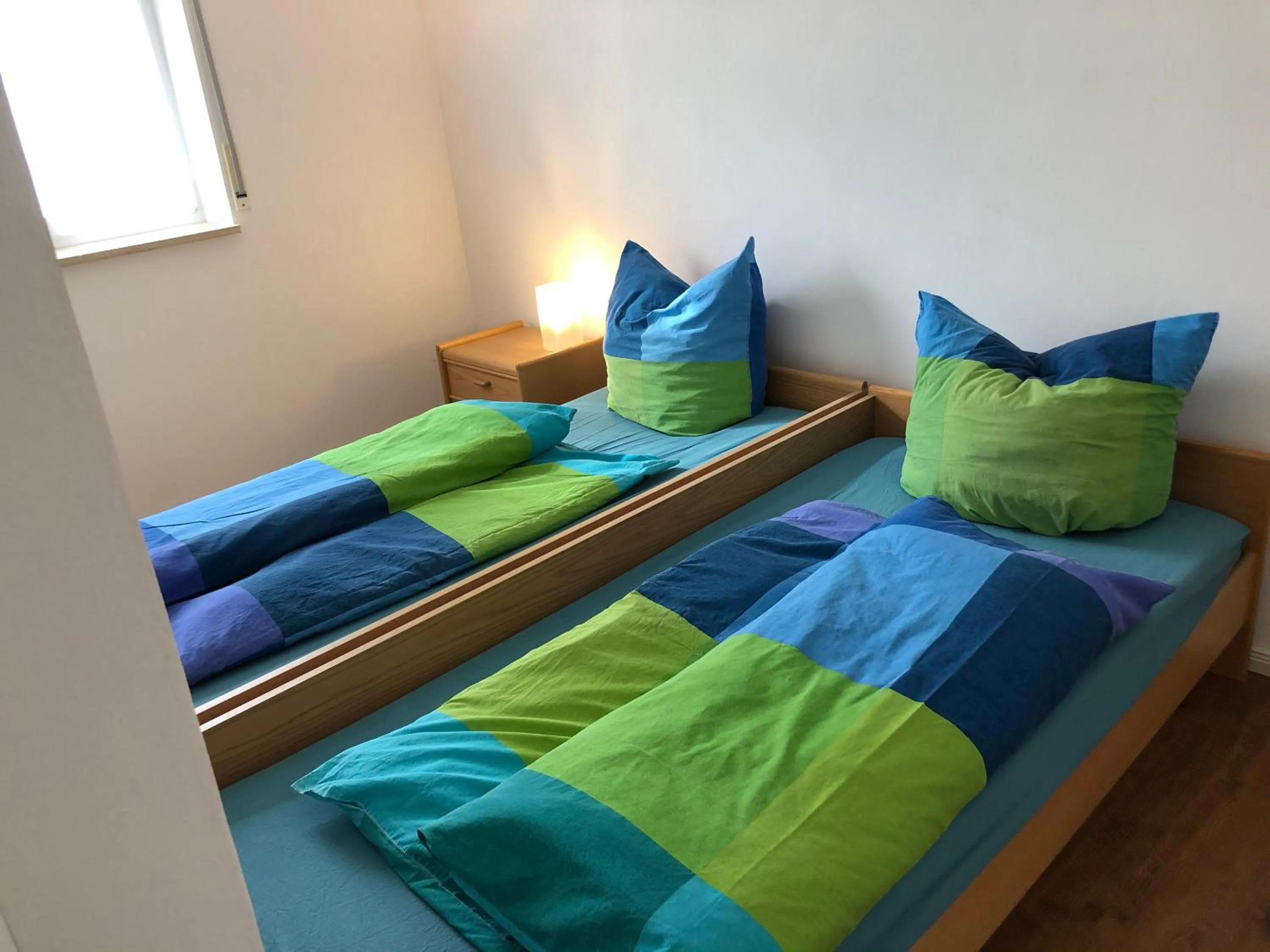 Bed in Für aktive Reisende mein Aparthotel Ochsenfurt mit Terrasse, ideal for long stay, relocation