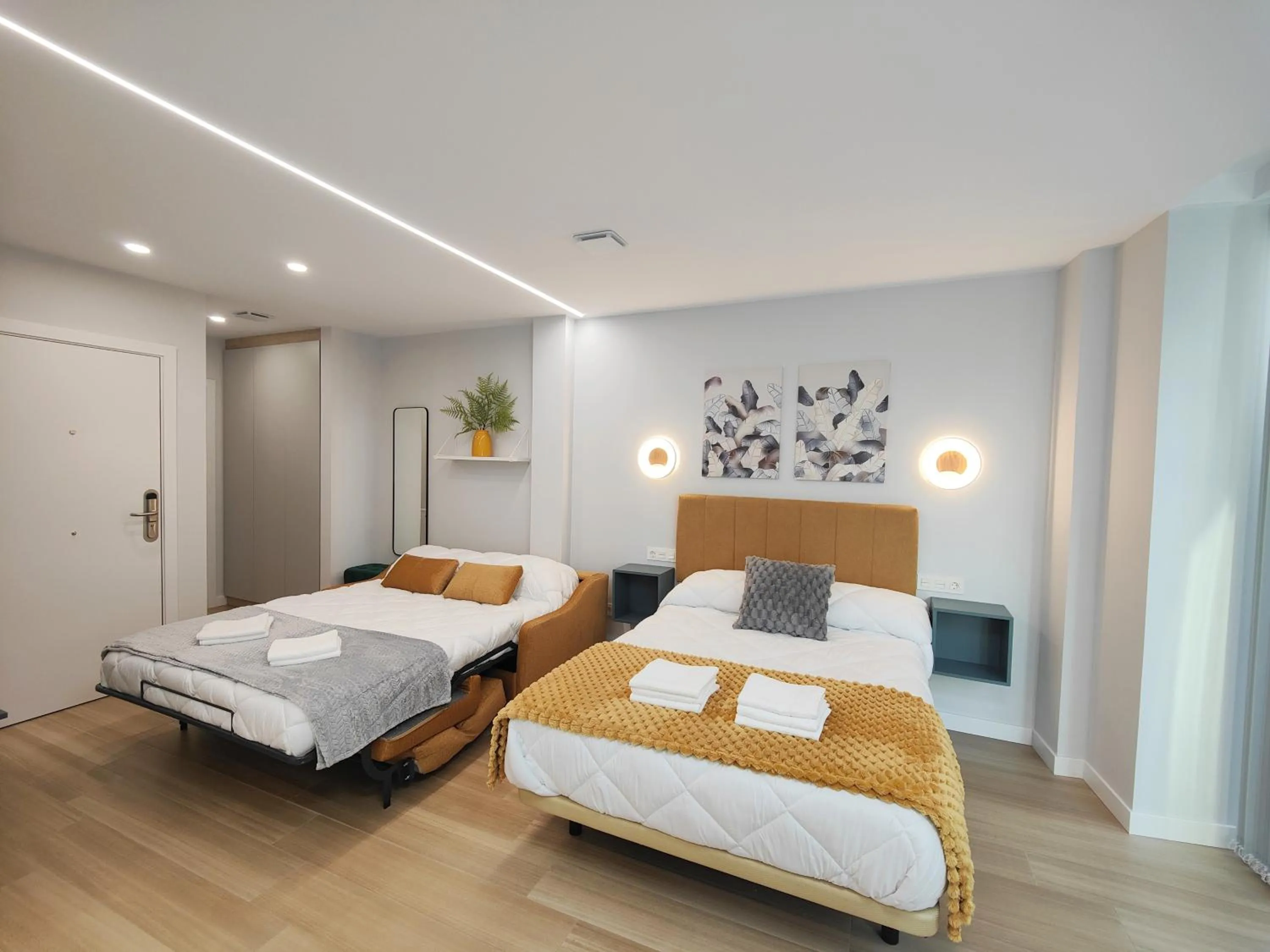 Living room, Bed in Apartamentos Centro Oviedo Caveda