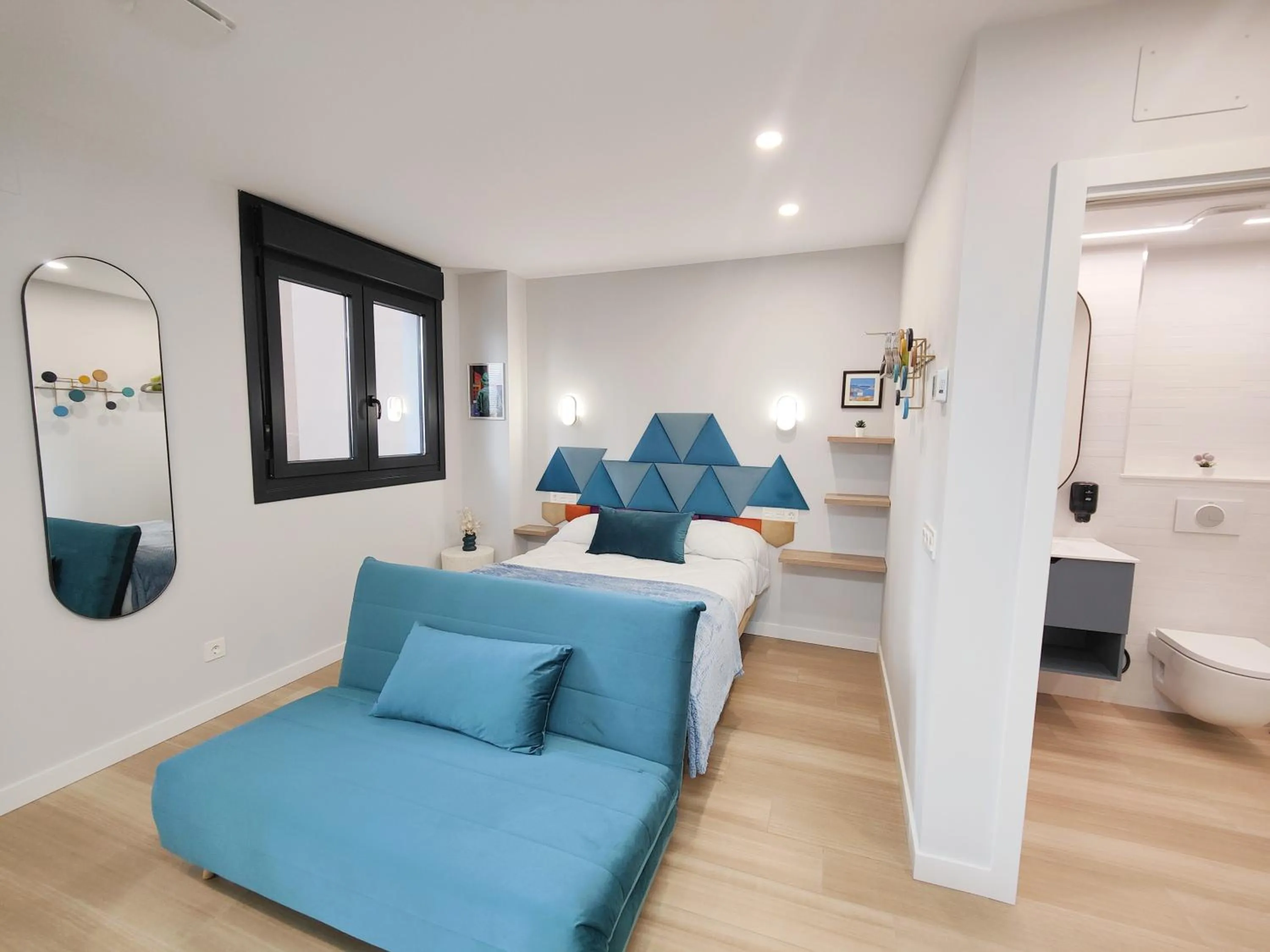 Living room, Bed in Apartamentos Centro Oviedo Caveda