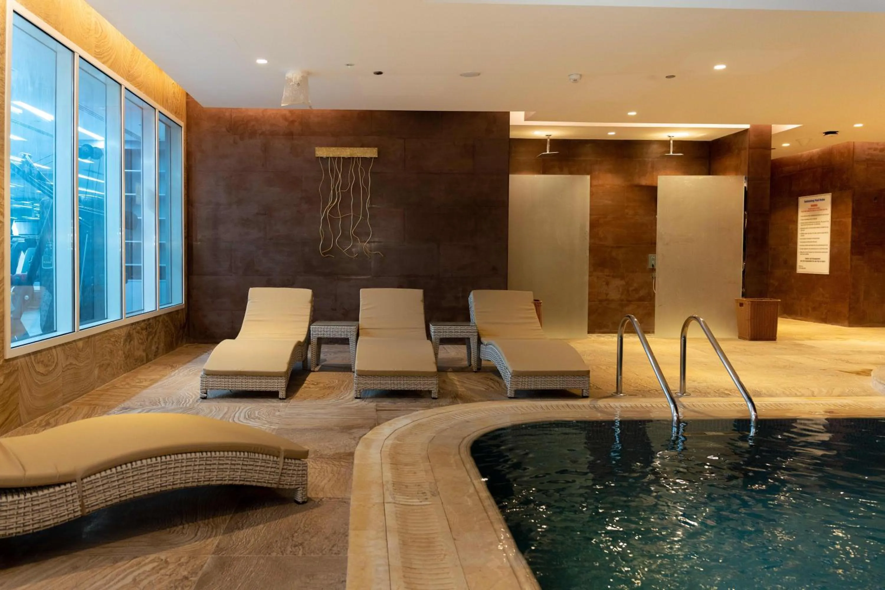 Swimming pool in Millennium Place Doha