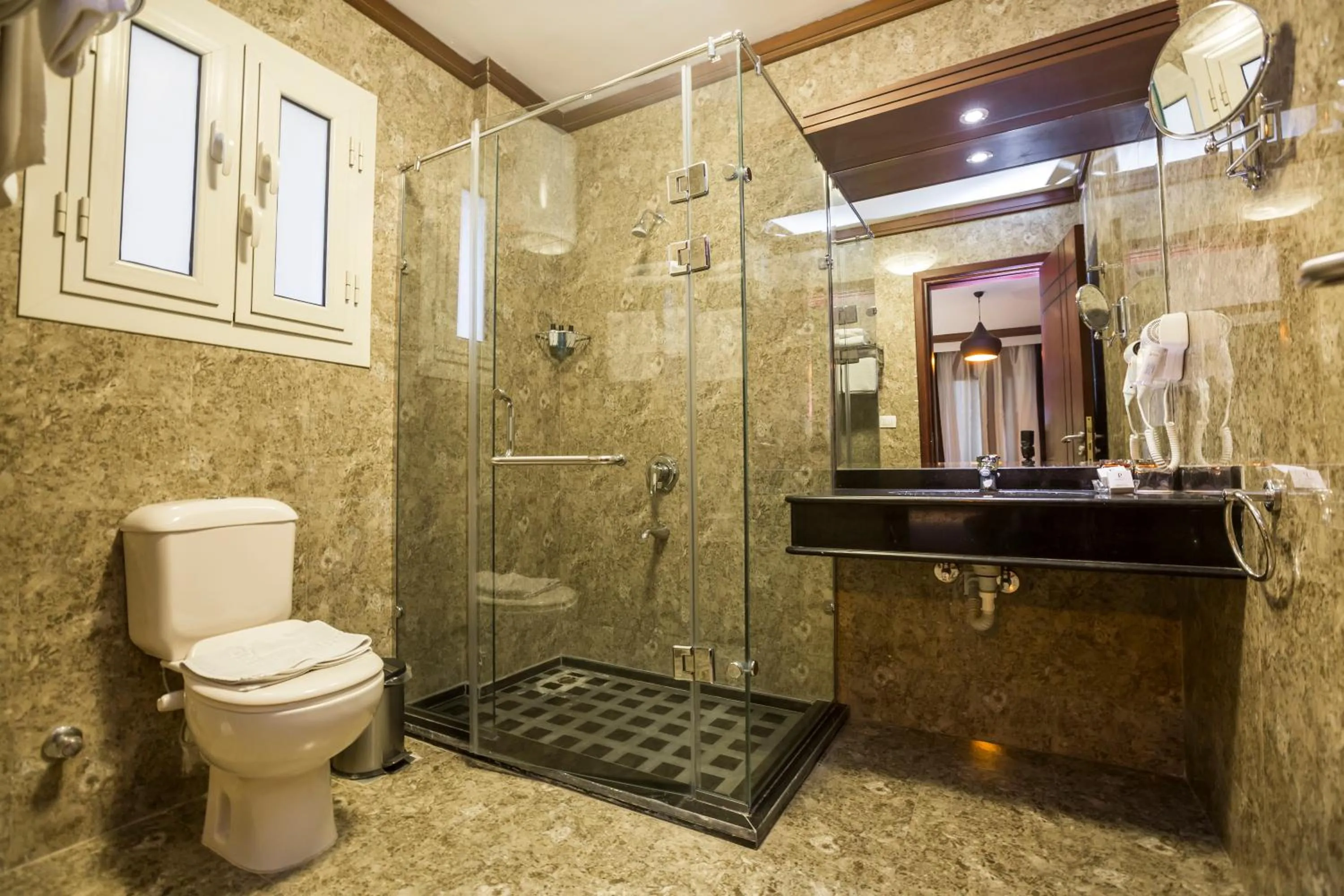 Bathroom in Panacea Suites Hotel