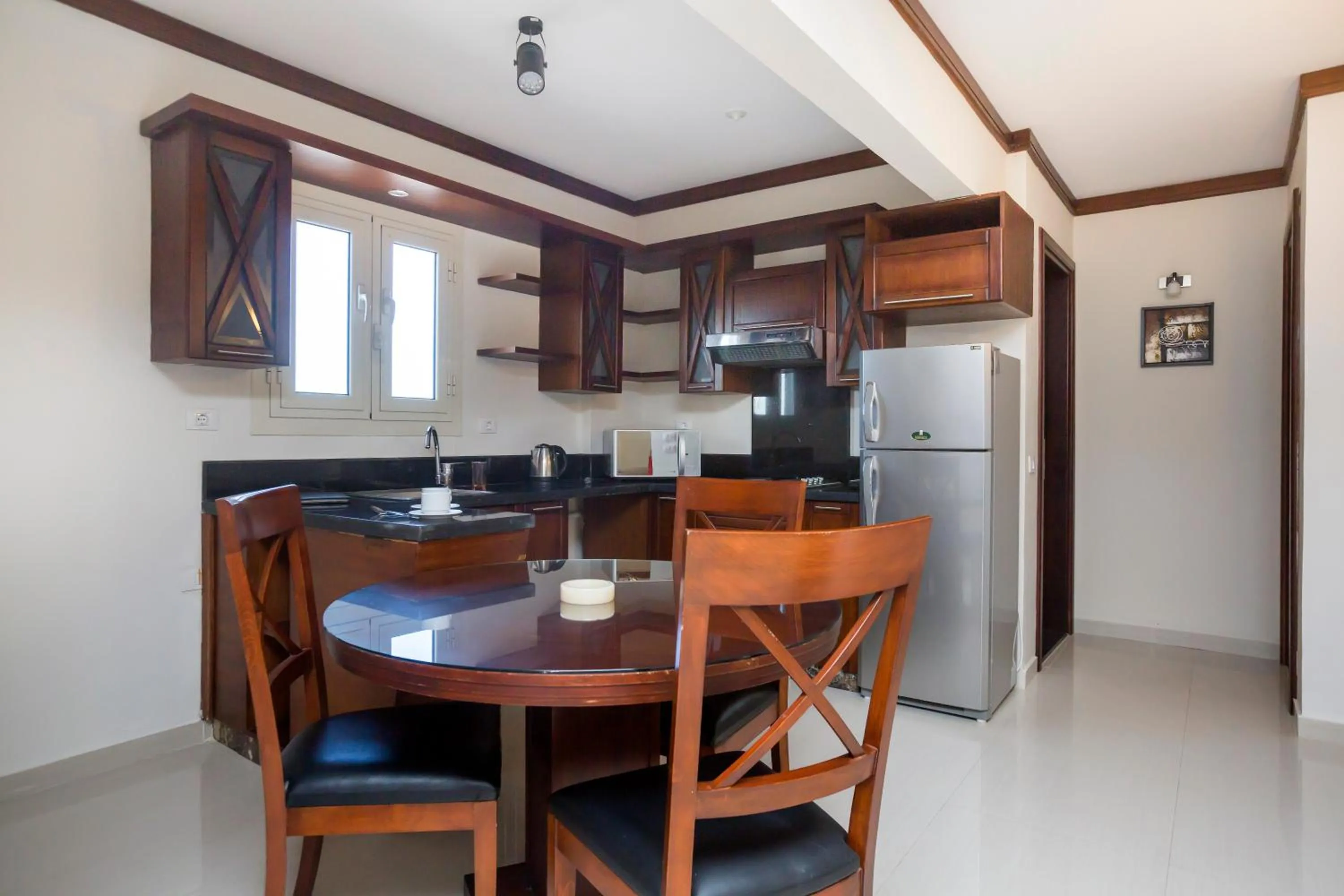 Kitchen or kitchenette in Panacea Suites Hotel