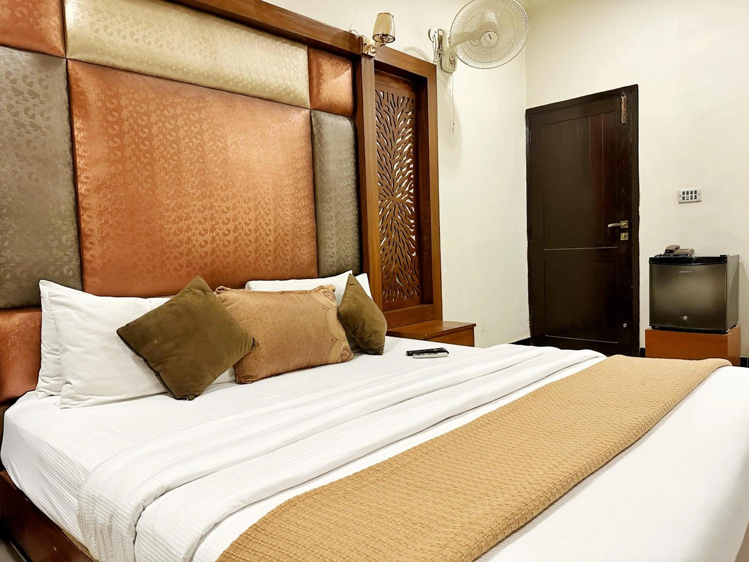 Bed in The Grand Hotel Multan