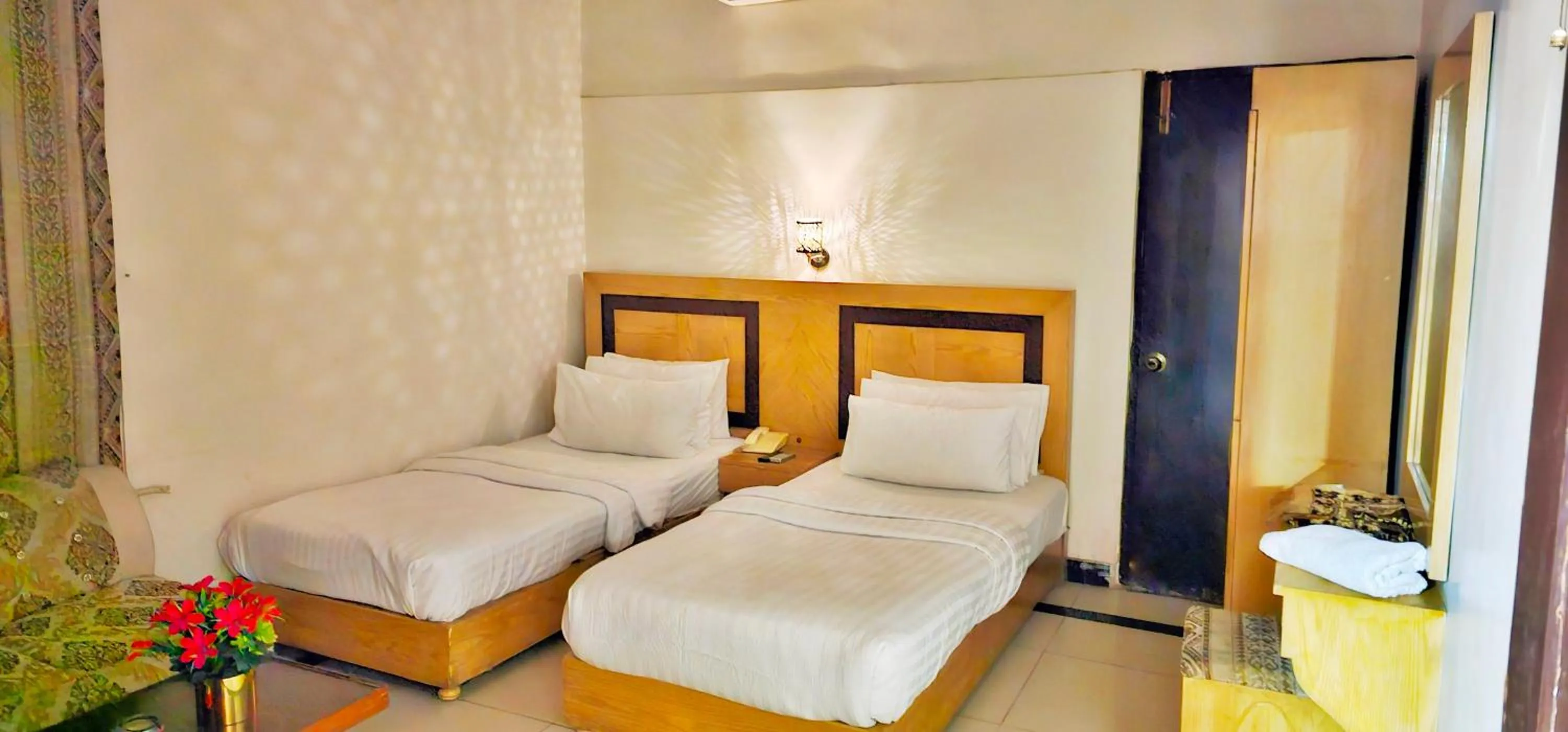 Bed in The Grand Hotel Multan