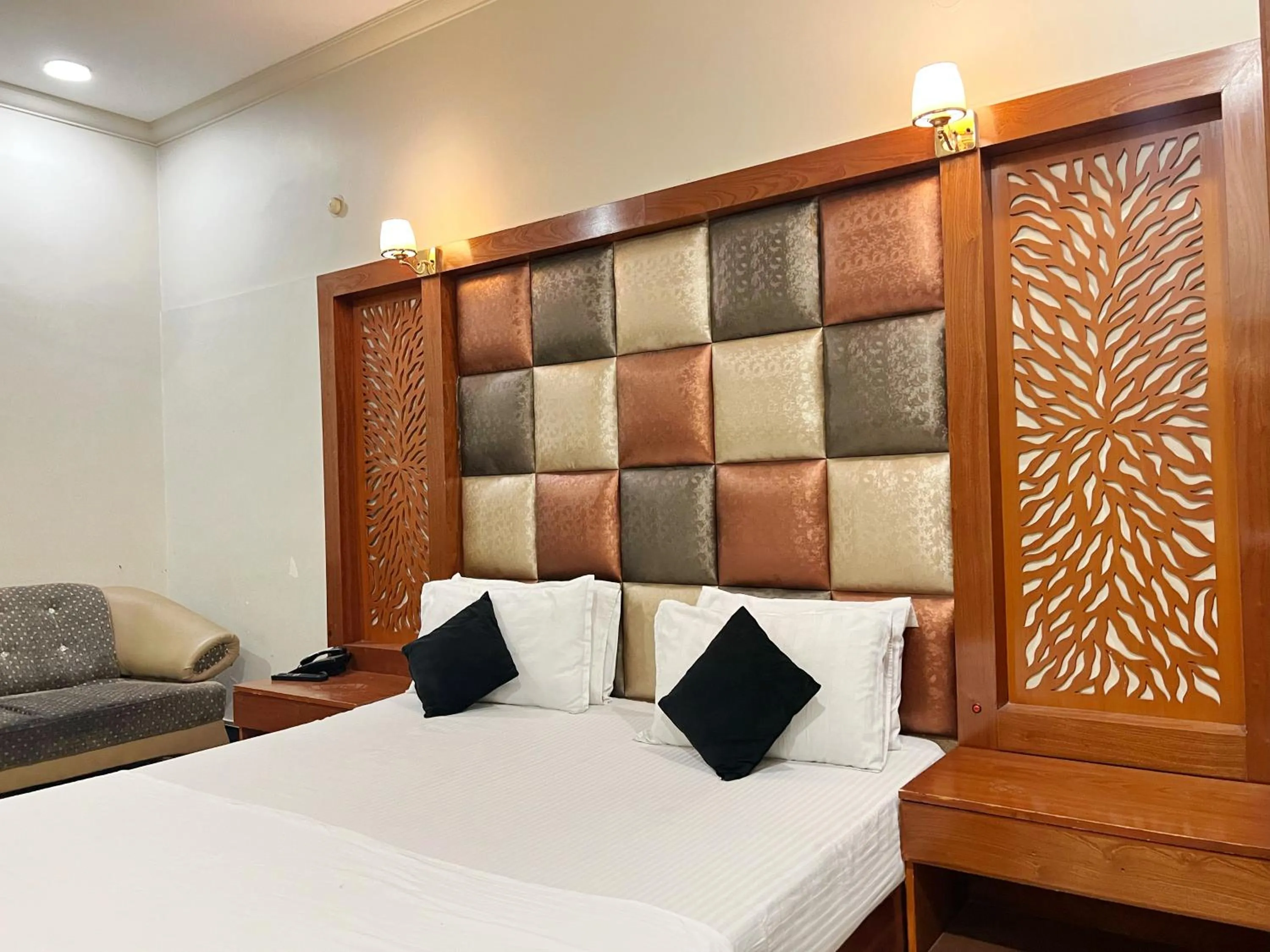 Bed in The Grand Hotel Multan