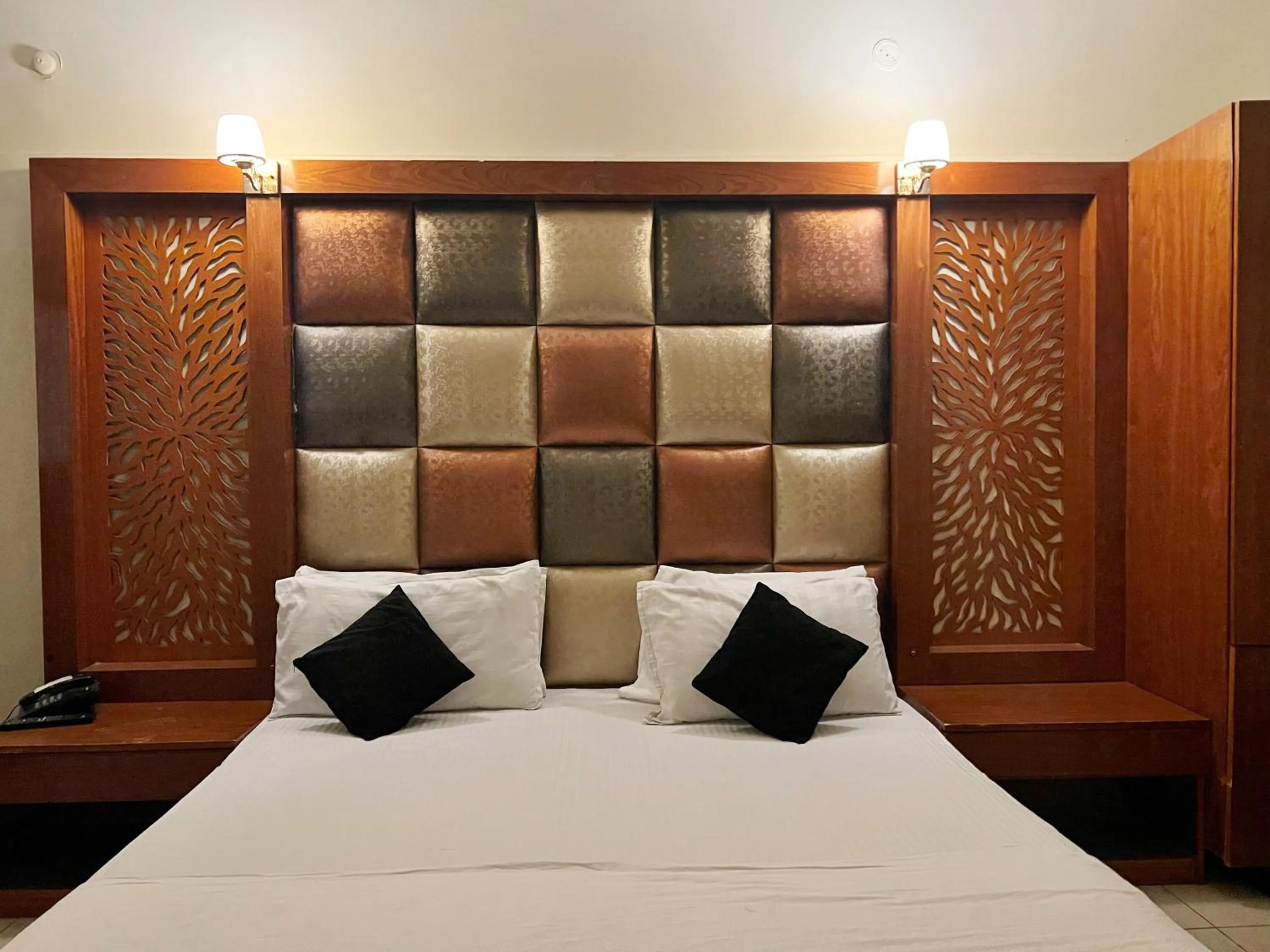 Bed in The Grand Hotel Multan