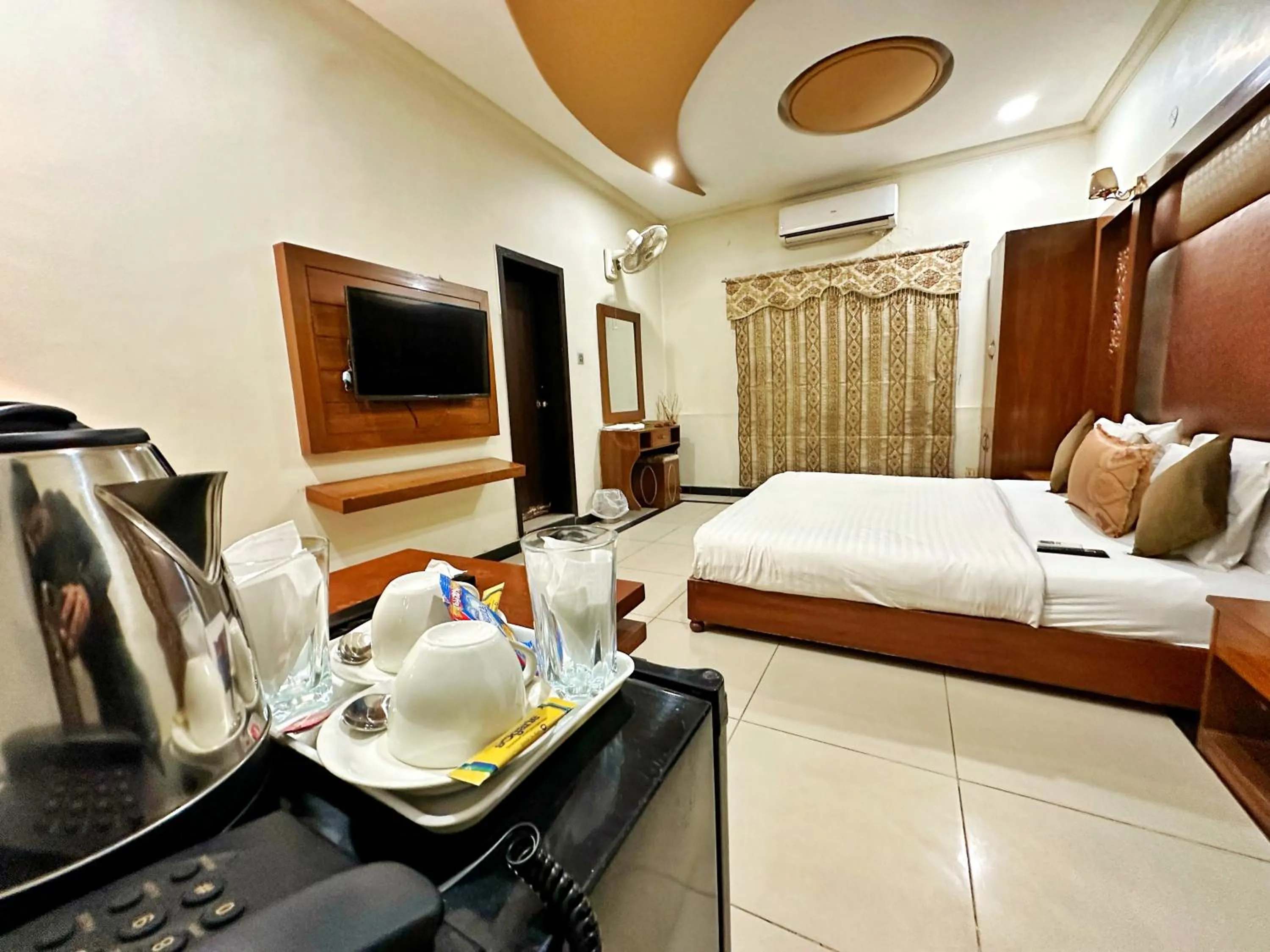 Bedroom, Bed in The Grand Hotel Multan