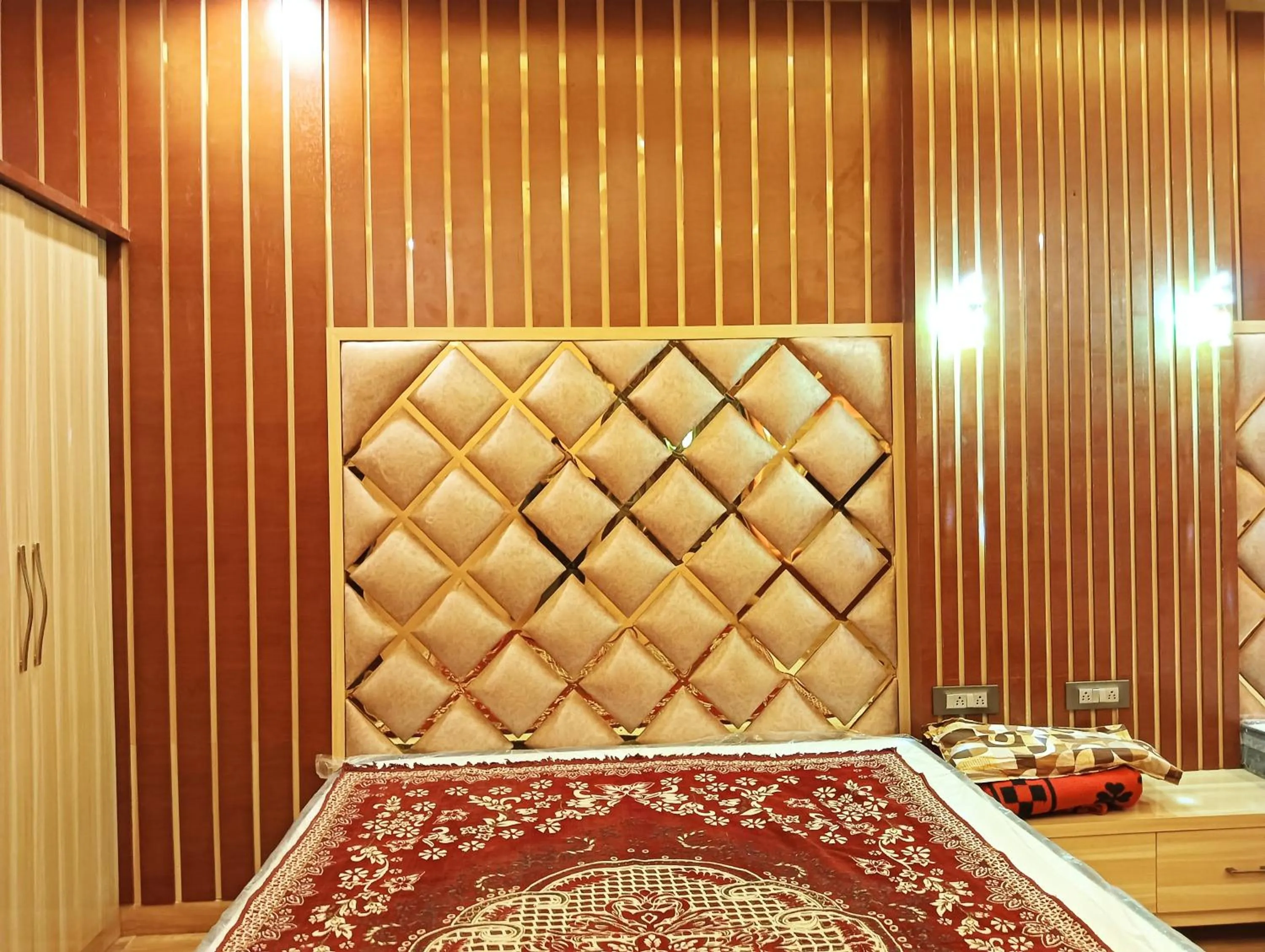 Bed in Hotel Ashok Vihar