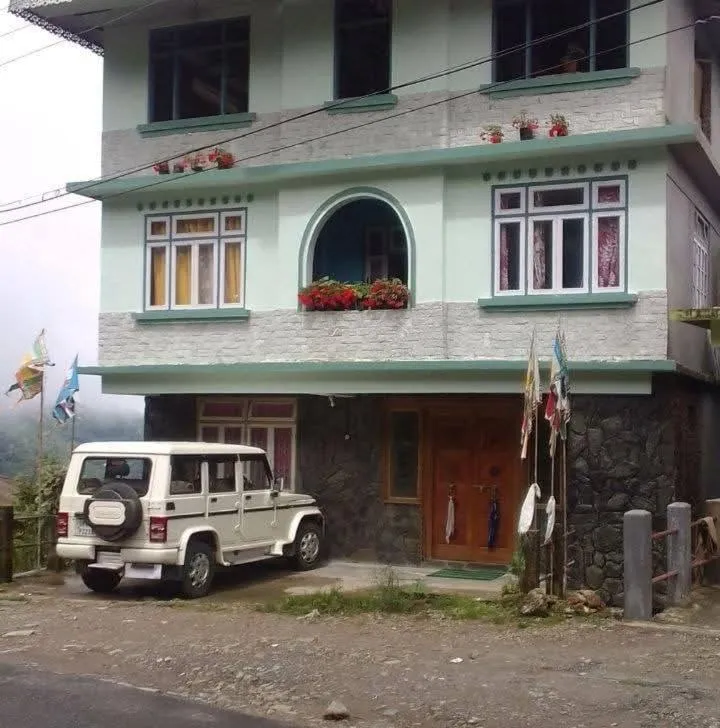 Property building in Hotel Happy Home