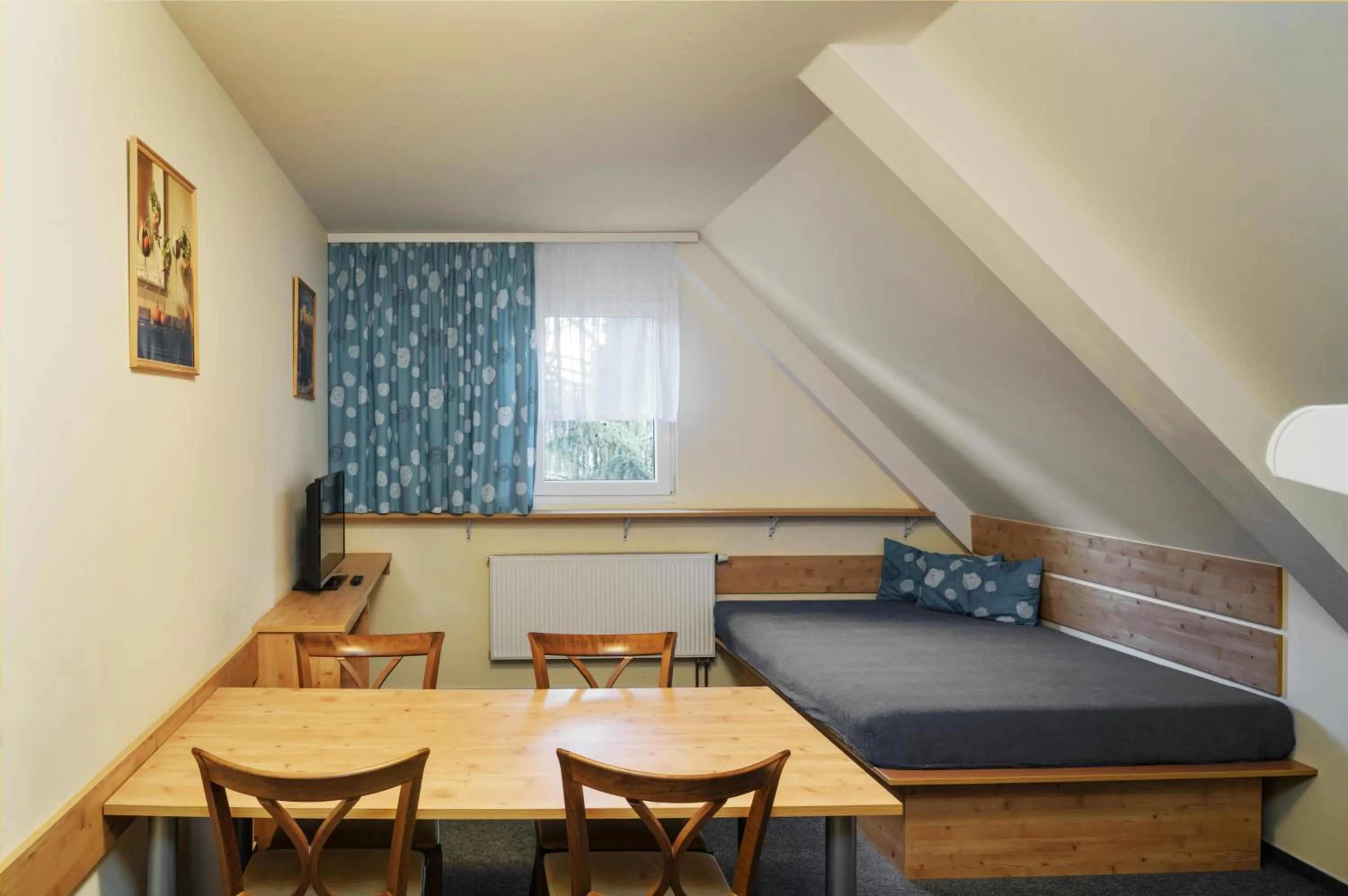 Living room, Bed in Horský Hotel Skiland