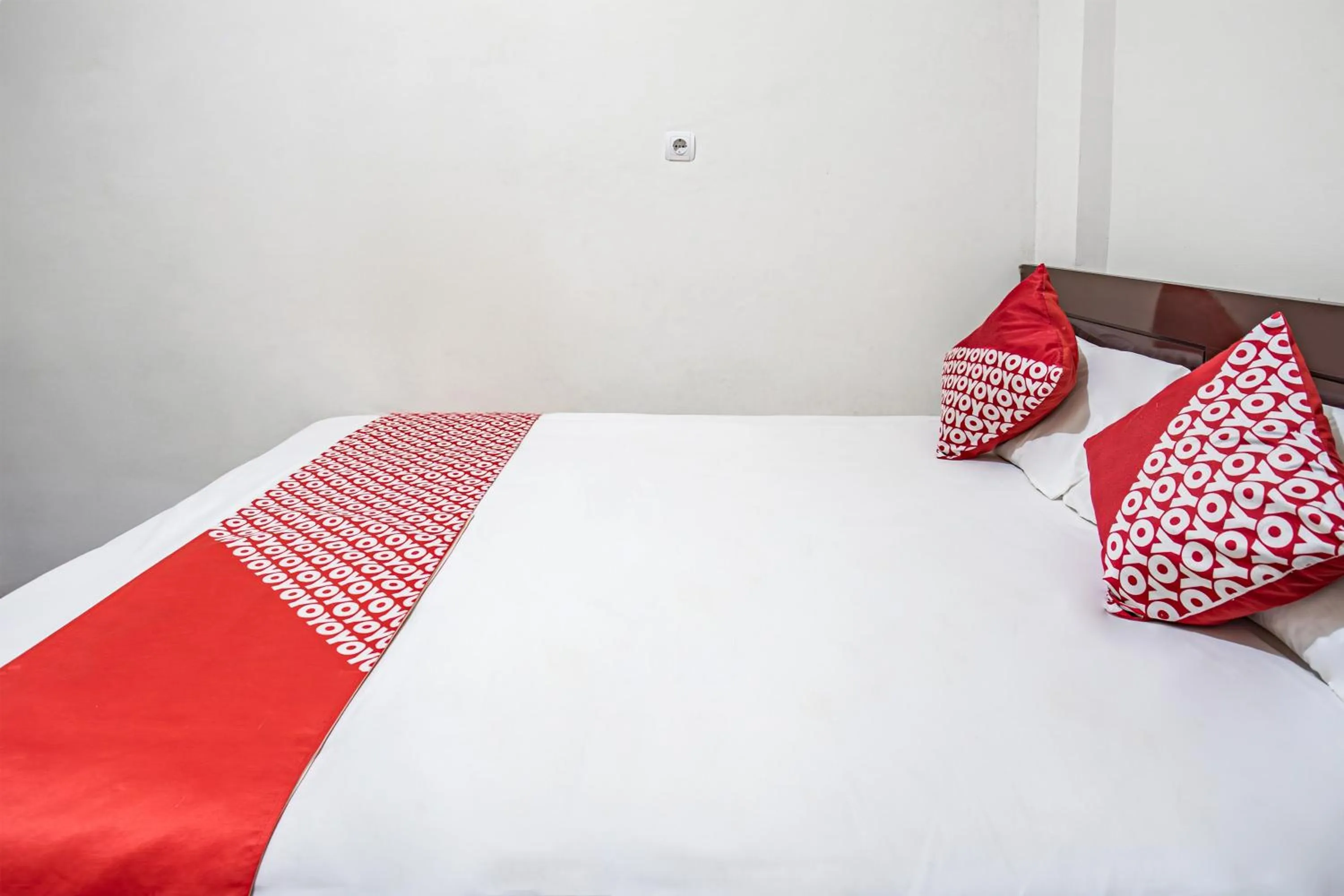 Bedroom in Hotel O Almahyra Guest House Syariah