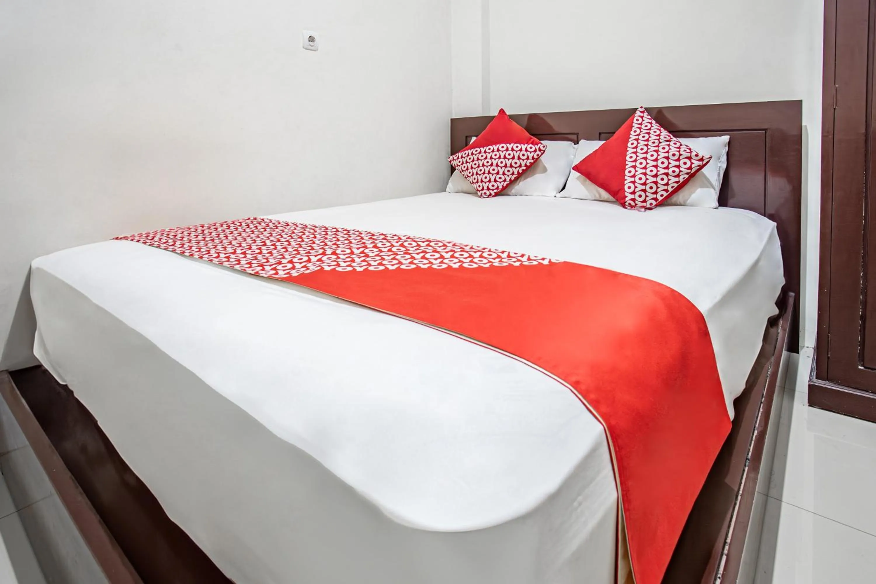 Bedroom in Hotel O Almahyra Guest House Syariah