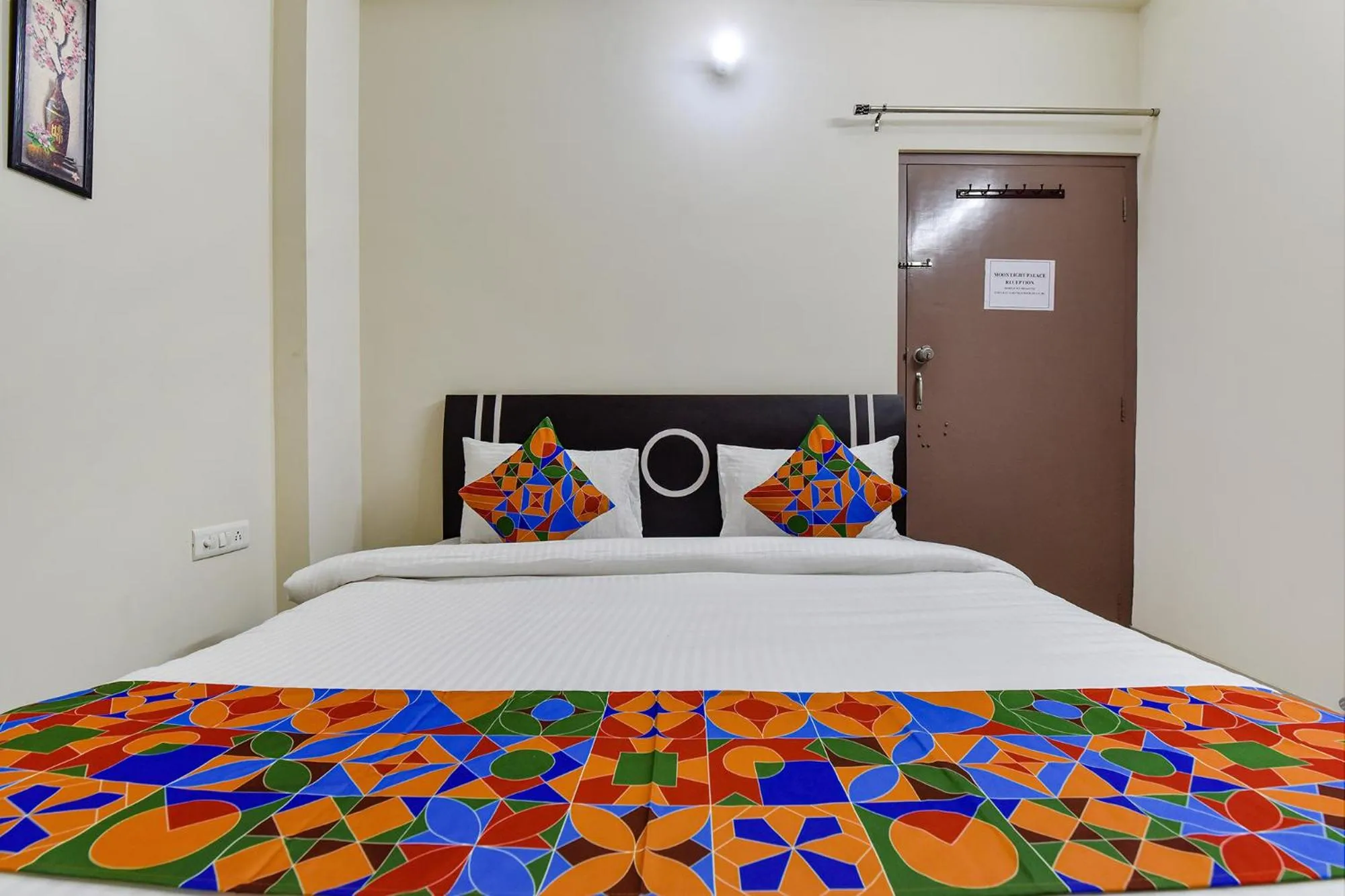 Bed in FabHotel Moon Light Palace