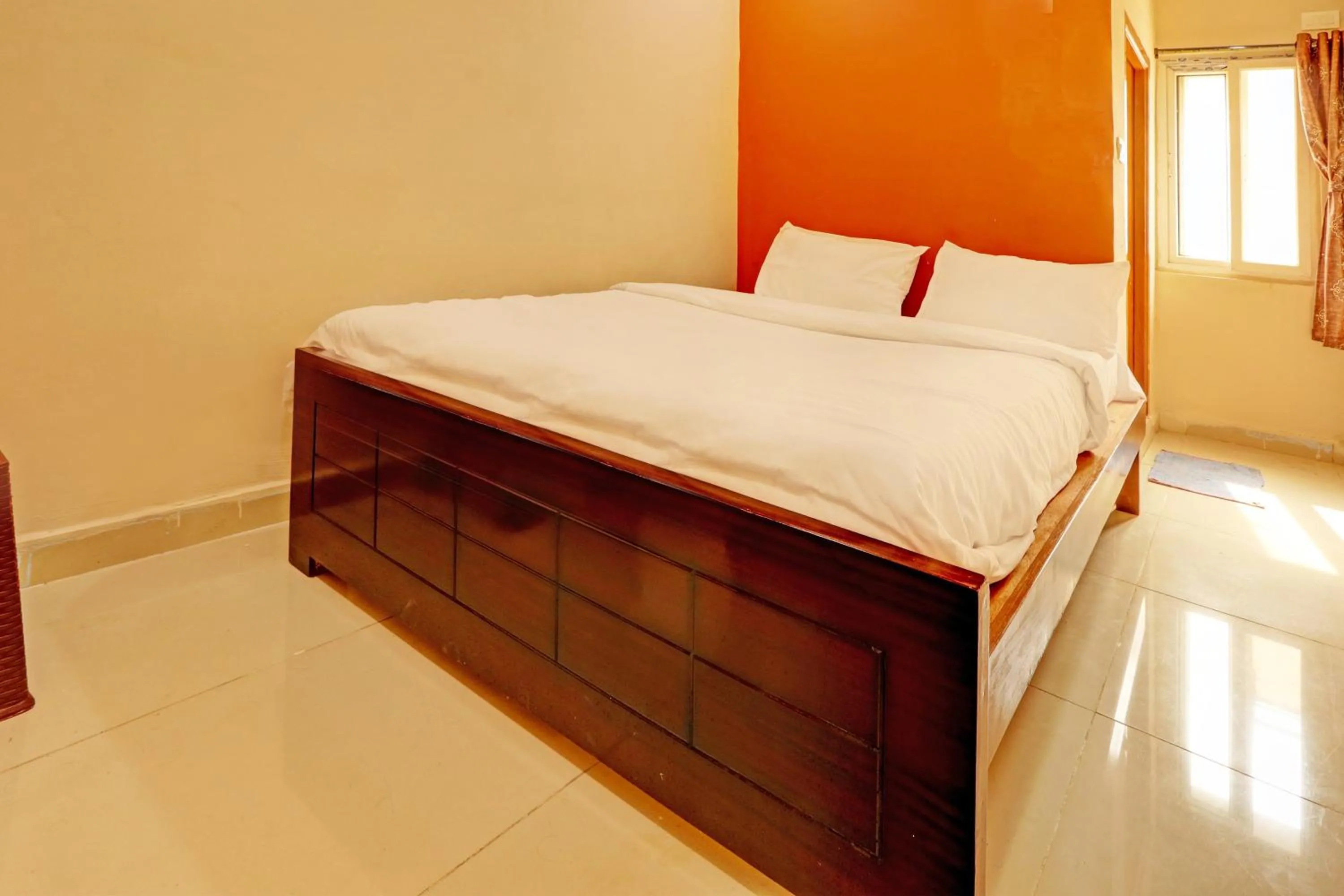 Bedroom in Hotel O Sriman Stay Inn