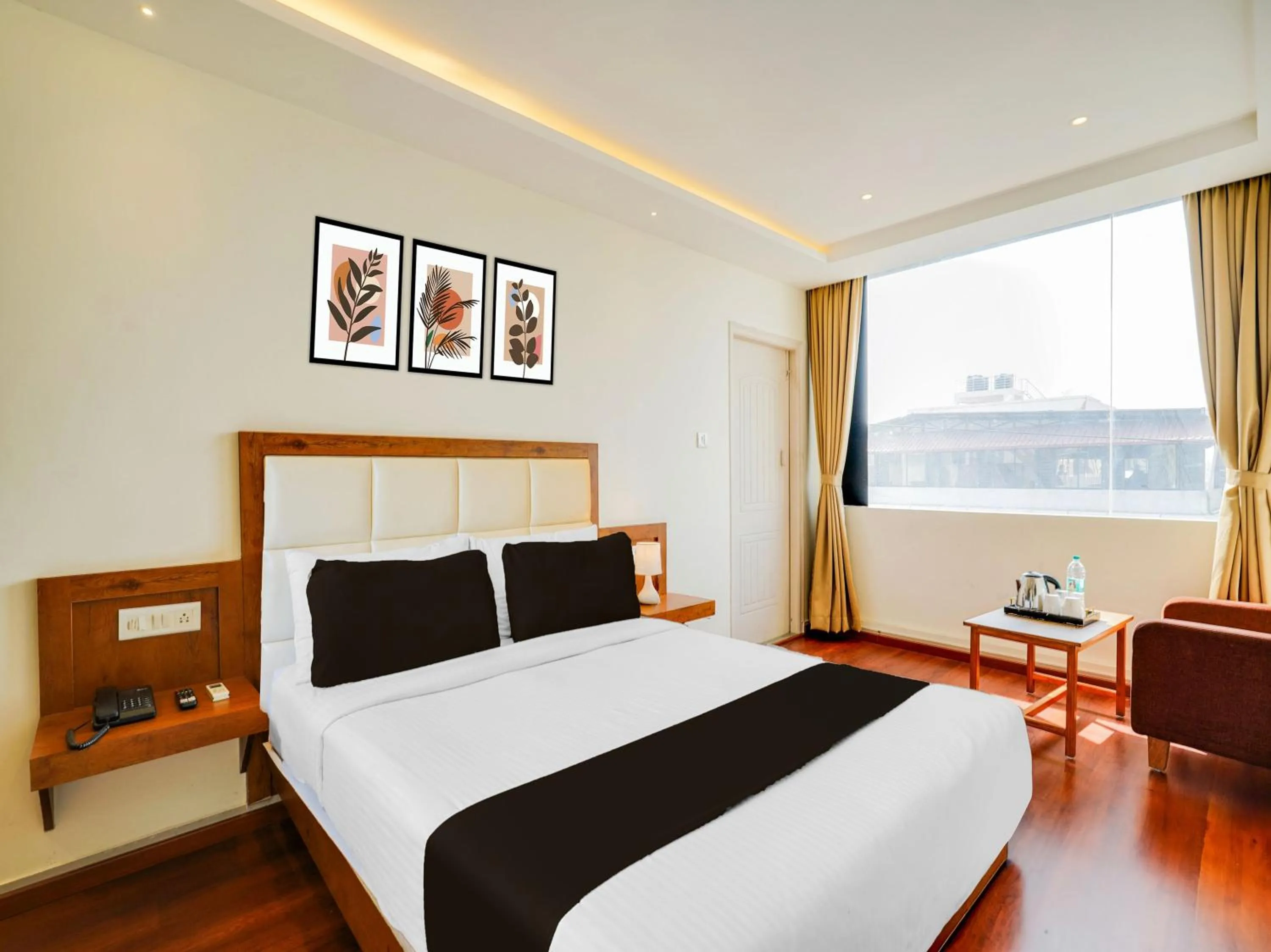 Bedroom, Bed in Super Townhouse Ramamurthy Nagar West Formerly Phoenix Hotel