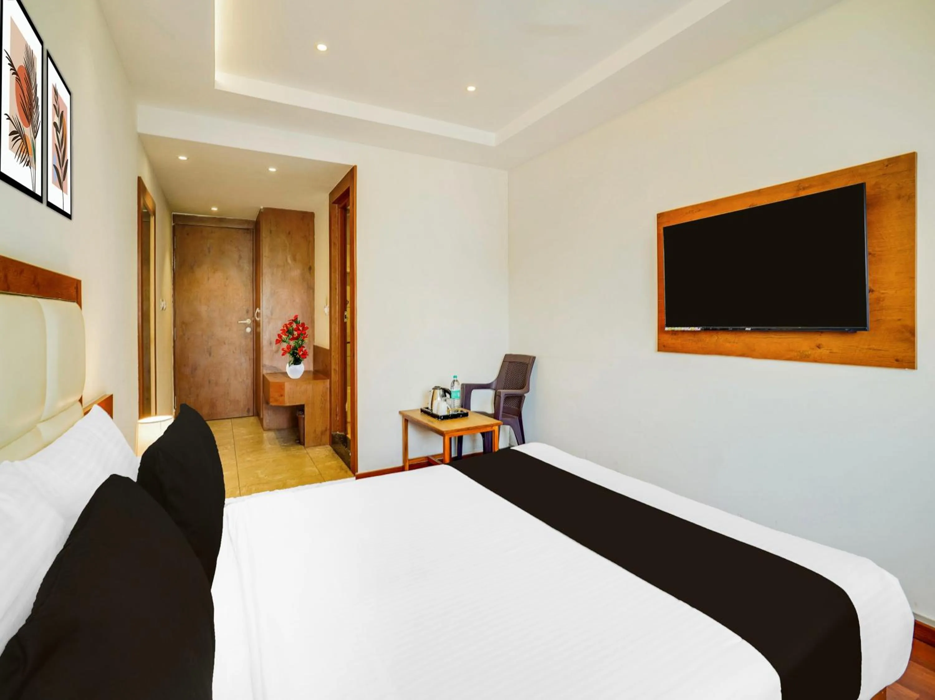 Bedroom, Bed in Super Townhouse Ramamurthy Nagar West Formerly Phoenix Hotel