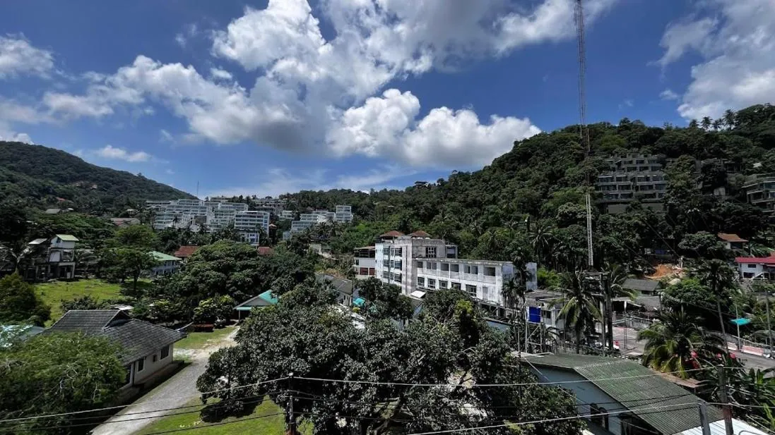 Property building in Coco Mountain View Guest House Hotel