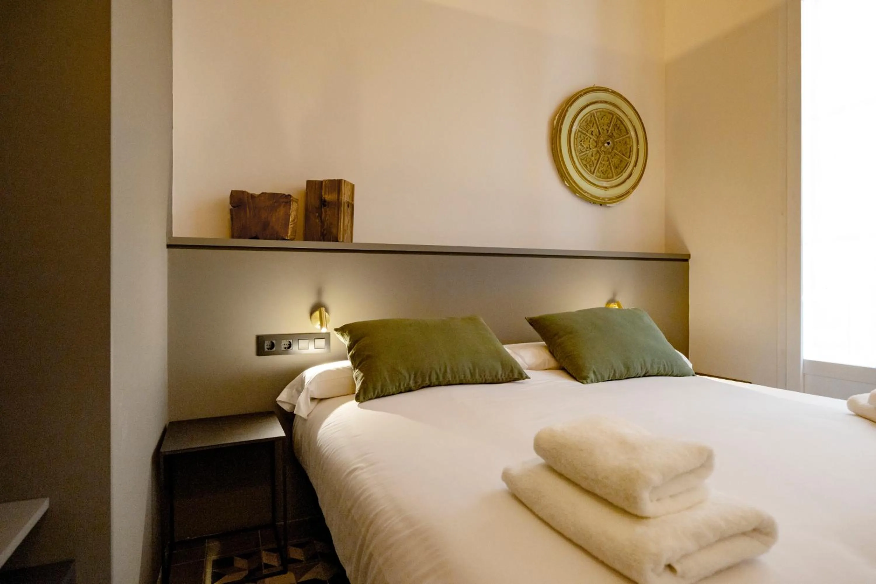 Bed in Hostal Porxos Garden