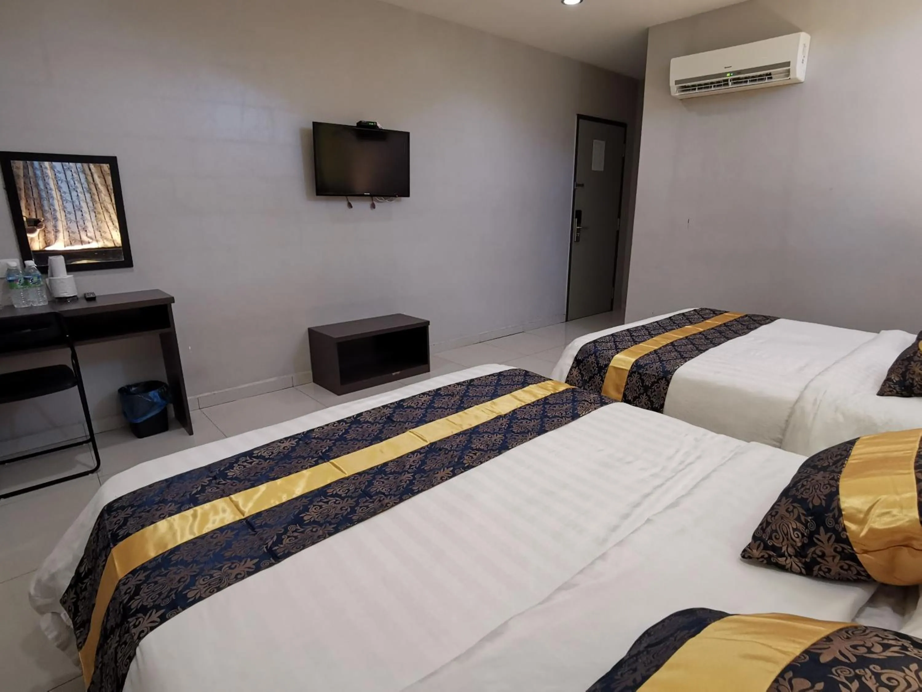 Bed in Star Bay Hotel