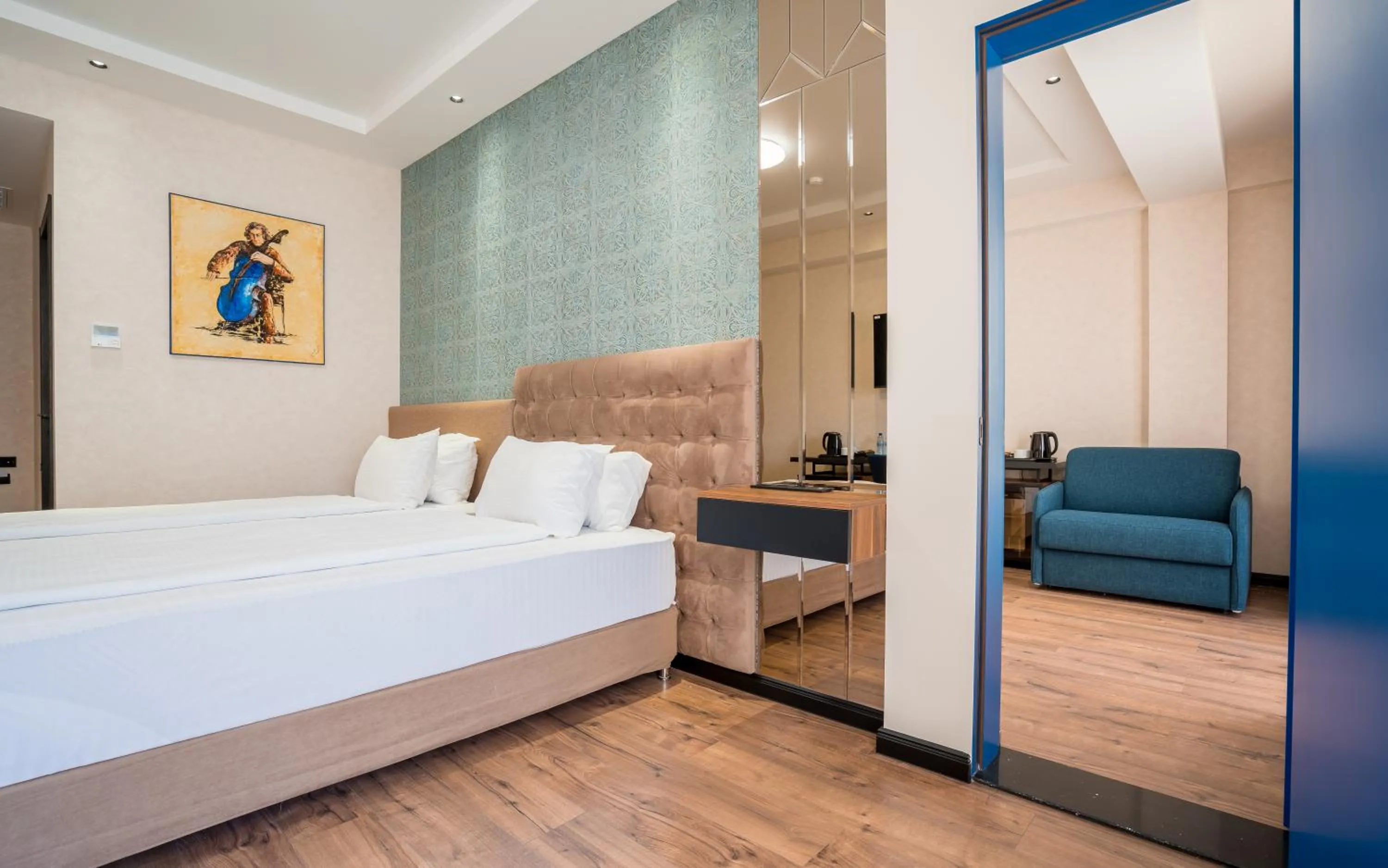 Photo of the whole room, Bed in Olympus Hotel By Umbrella