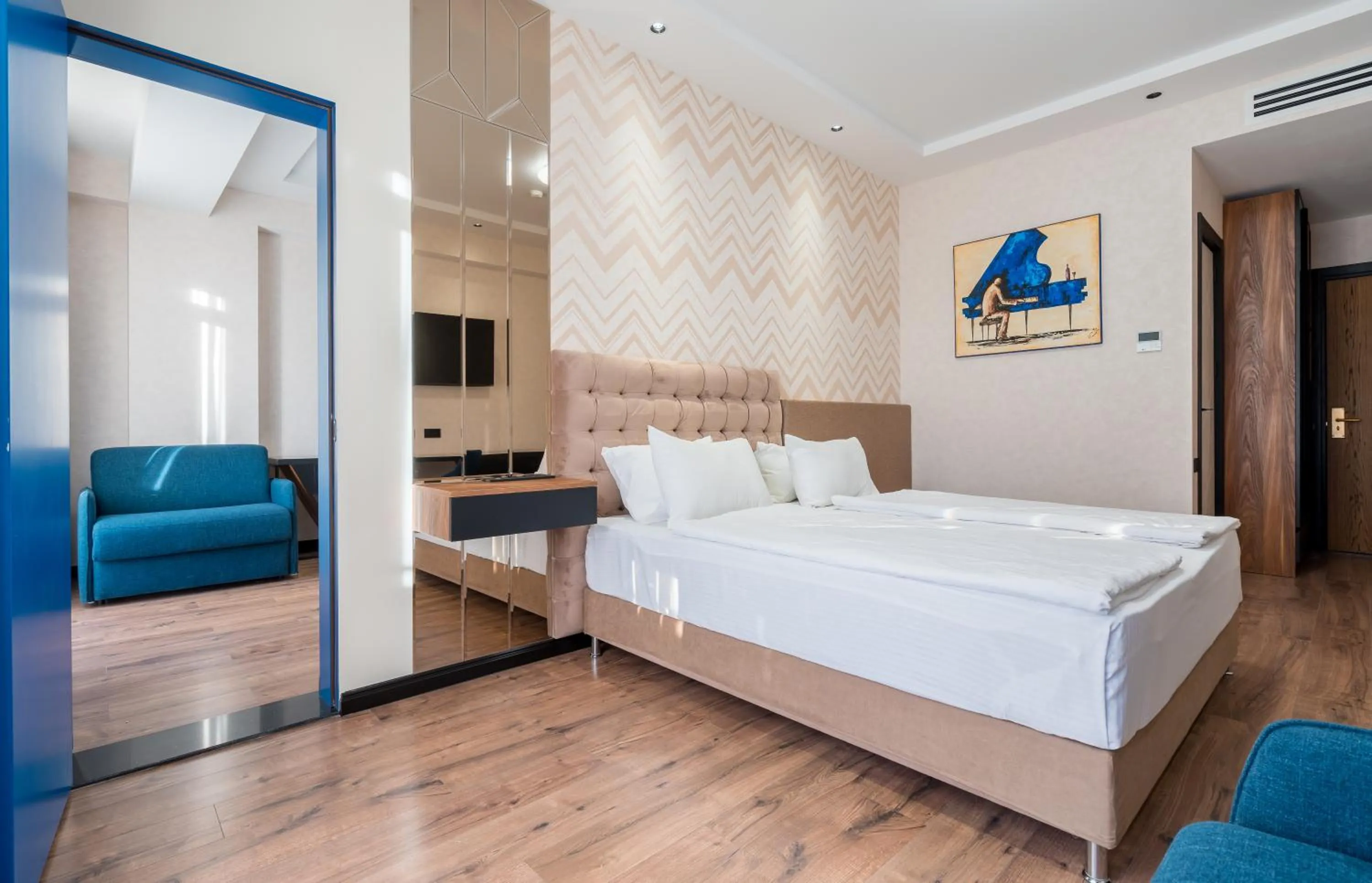 Photo of the whole room, Bed in Olympus Hotel By Umbrella