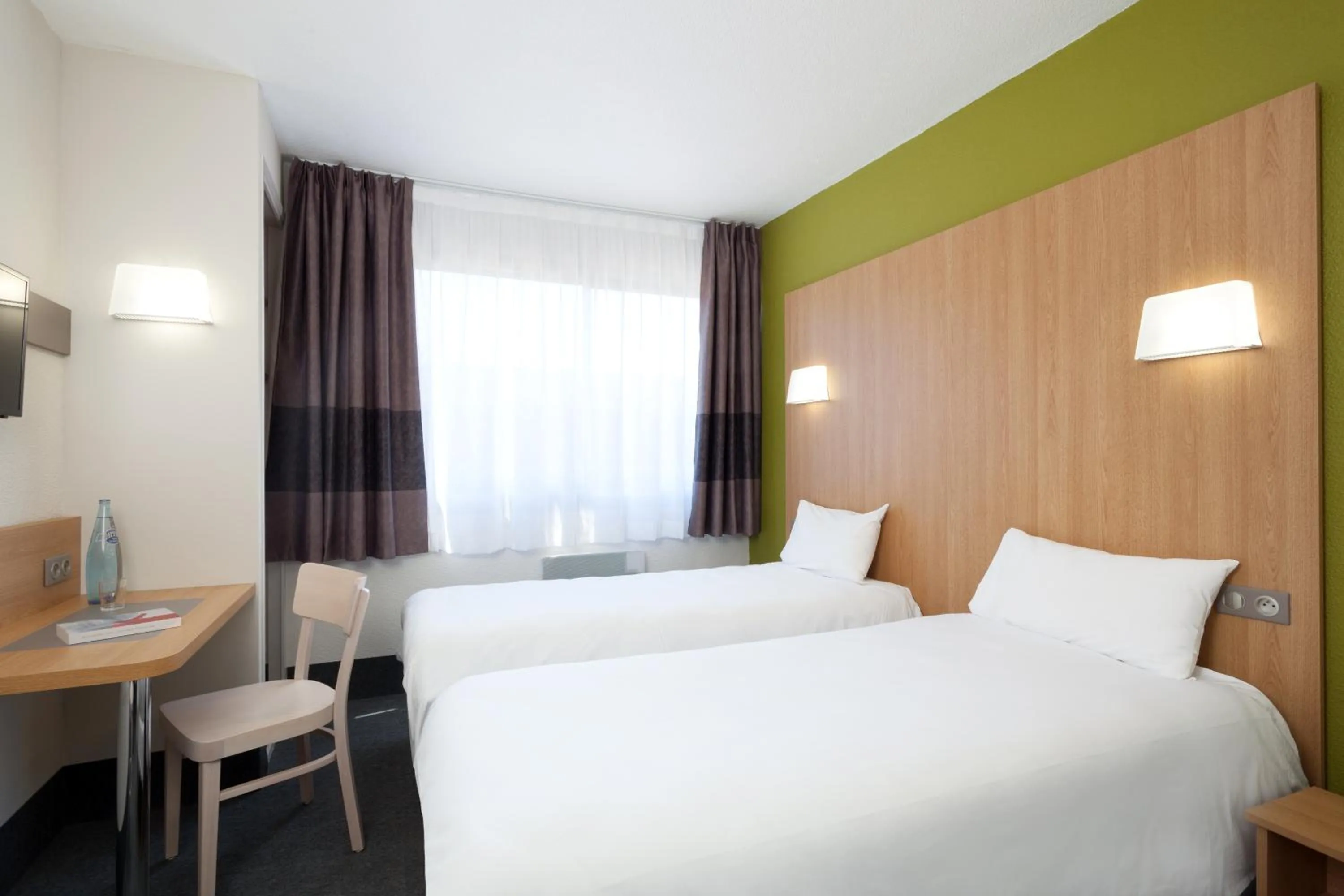 Bedroom, Bed in B&B HOTEL Nîmes Ville Active, parking sécurisé gratuit