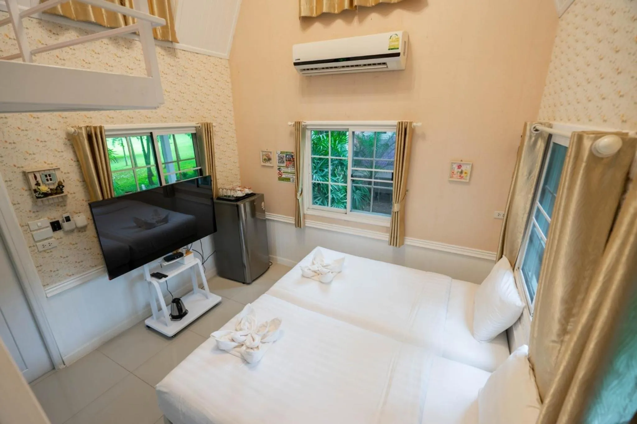 Bed in Puprai Tarnnarm Resort