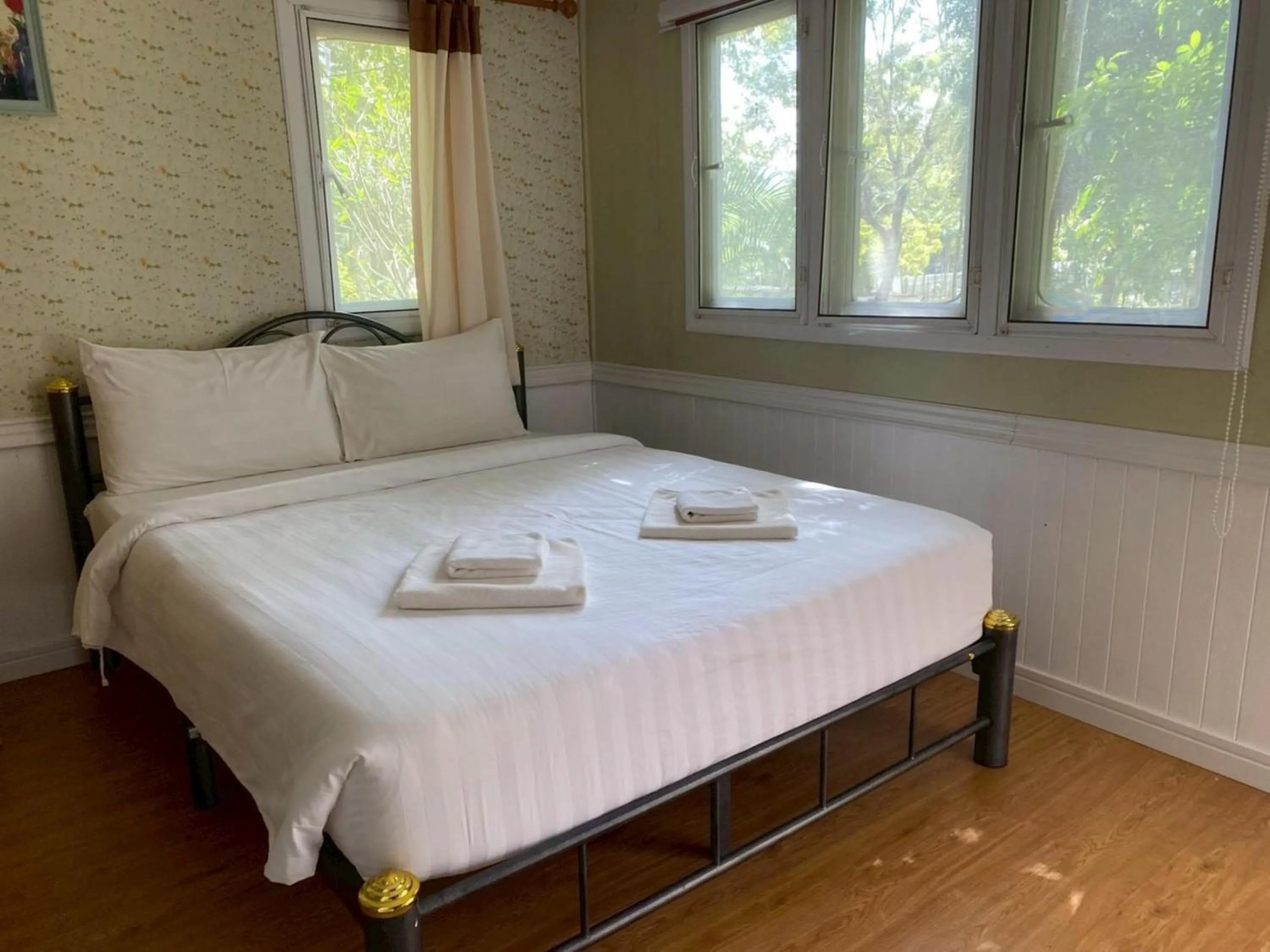 Bed in Puprai Tarnnarm Resort