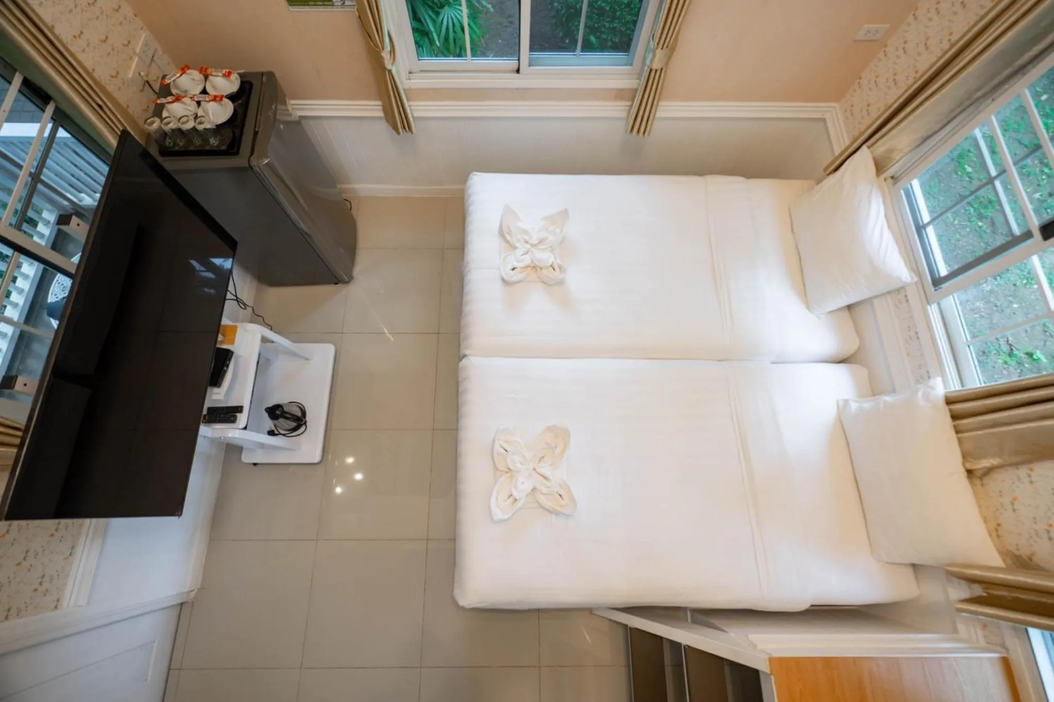 Bed in Puprai Tarnnarm Resort