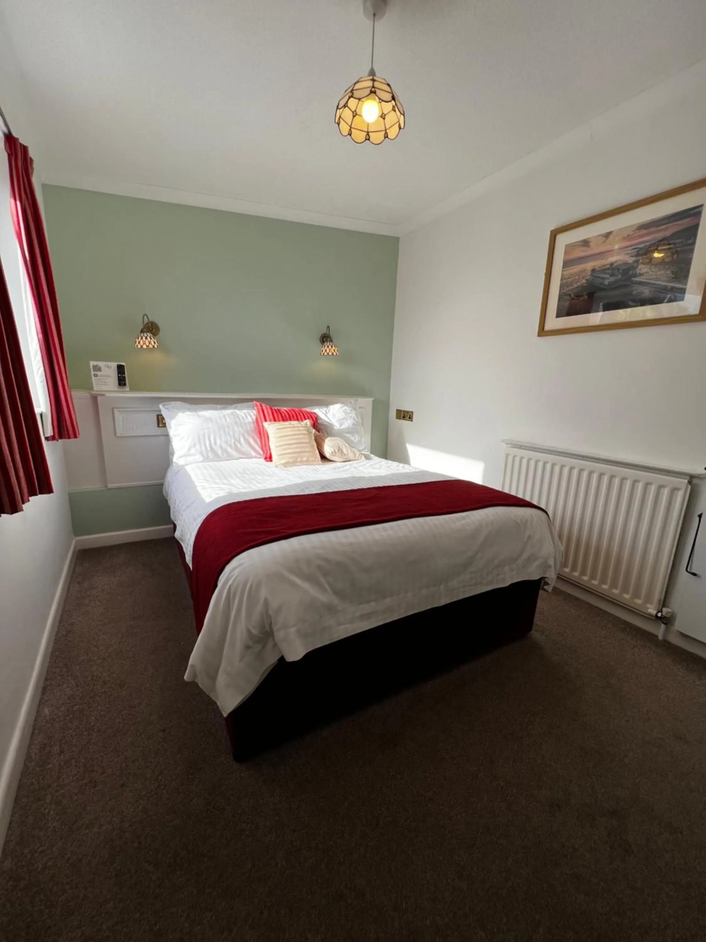 Bed in Queenswood Hotel