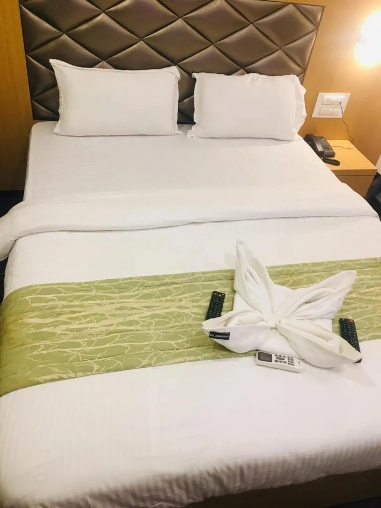 Bed in AR By Glitz Hotels