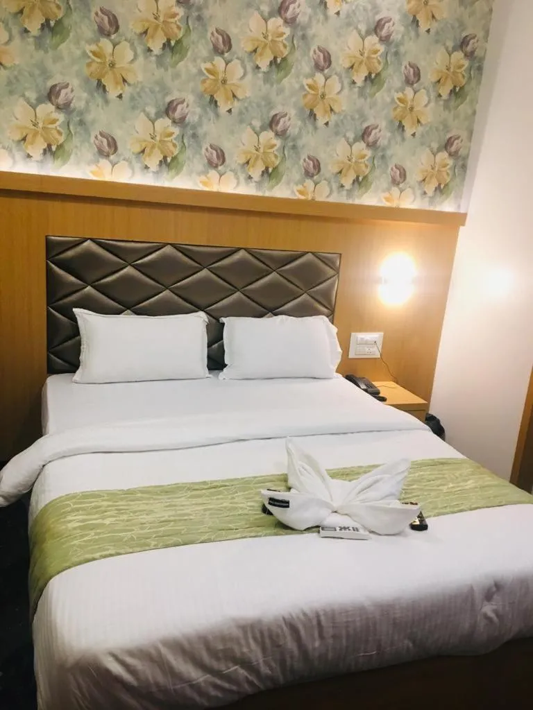 Bed in AR By Glitz Hotels