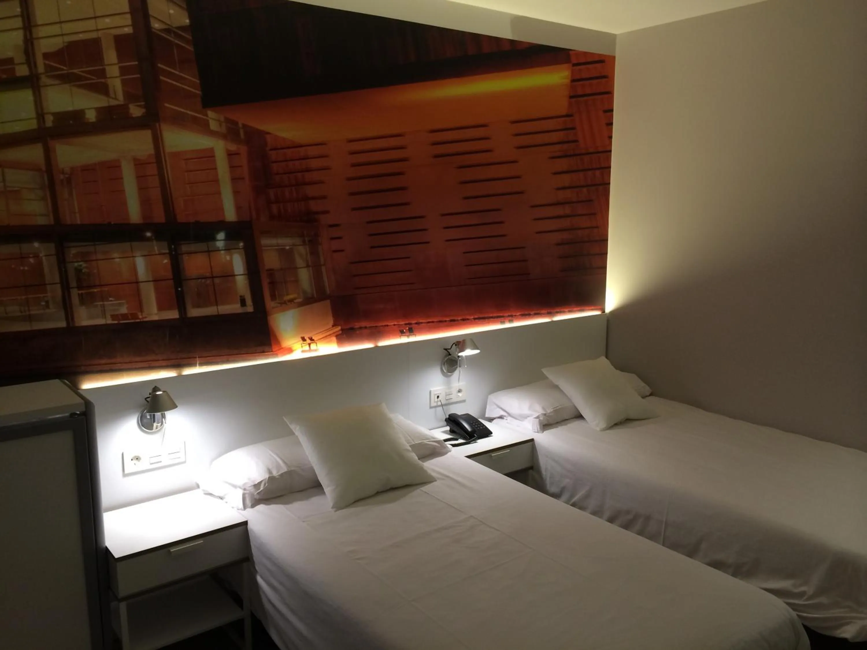Bed in Bilbao City Rooms