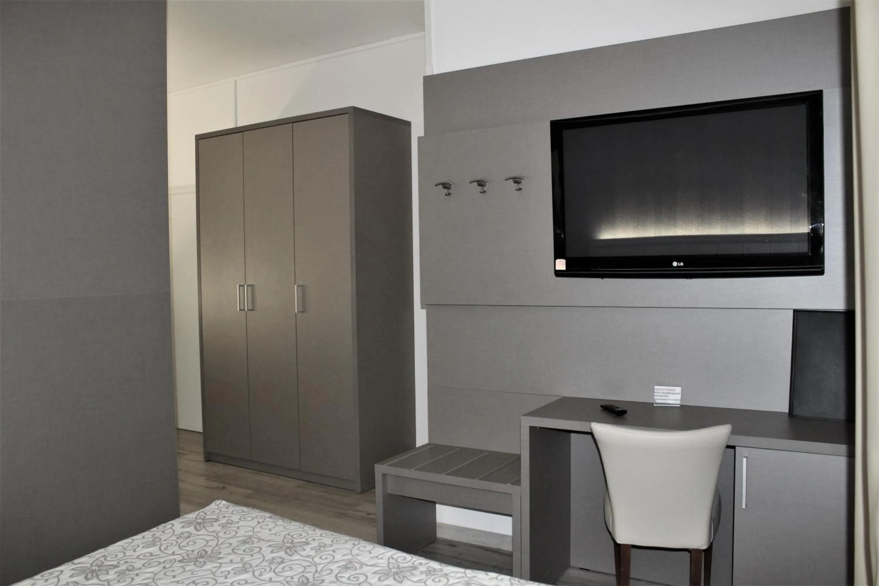 Communal lounge/ TV room in Albergo Ristorante Miramonti Toano