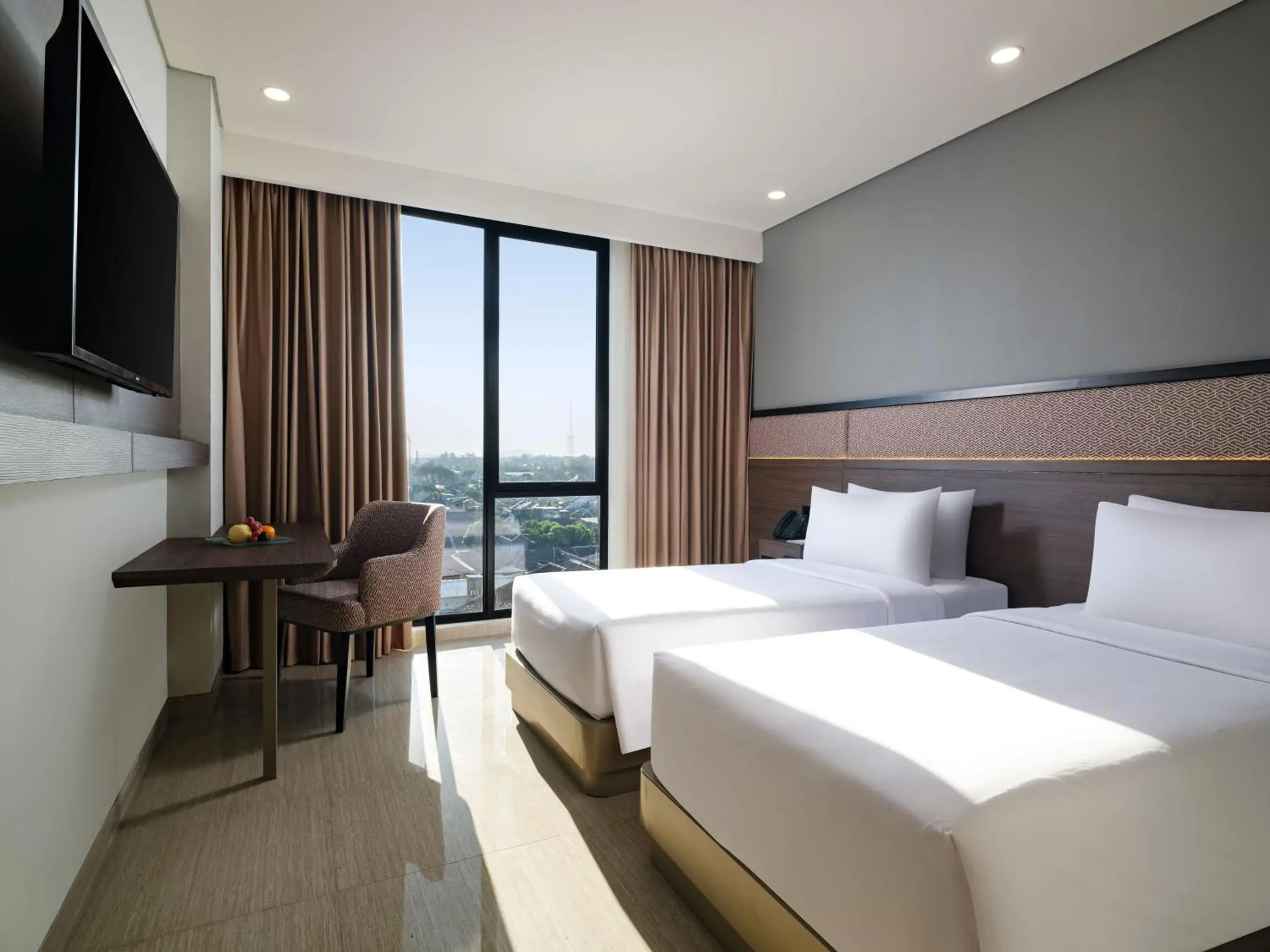 Deluxe Twin Room in Hotel Santika Blitar Deluxe Twin Room in Hotel Santika Blitar