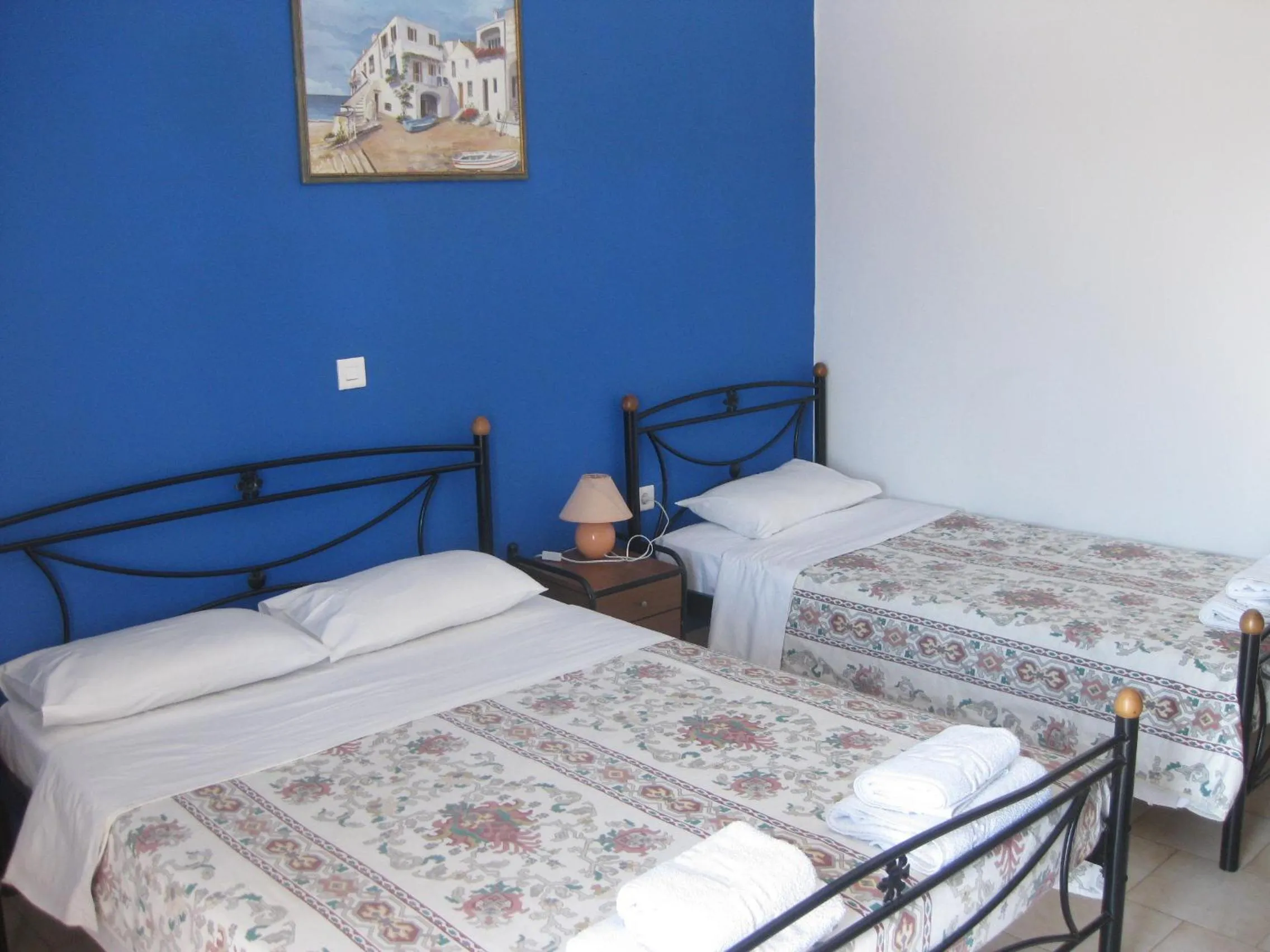 Bed in Calypso Hotel