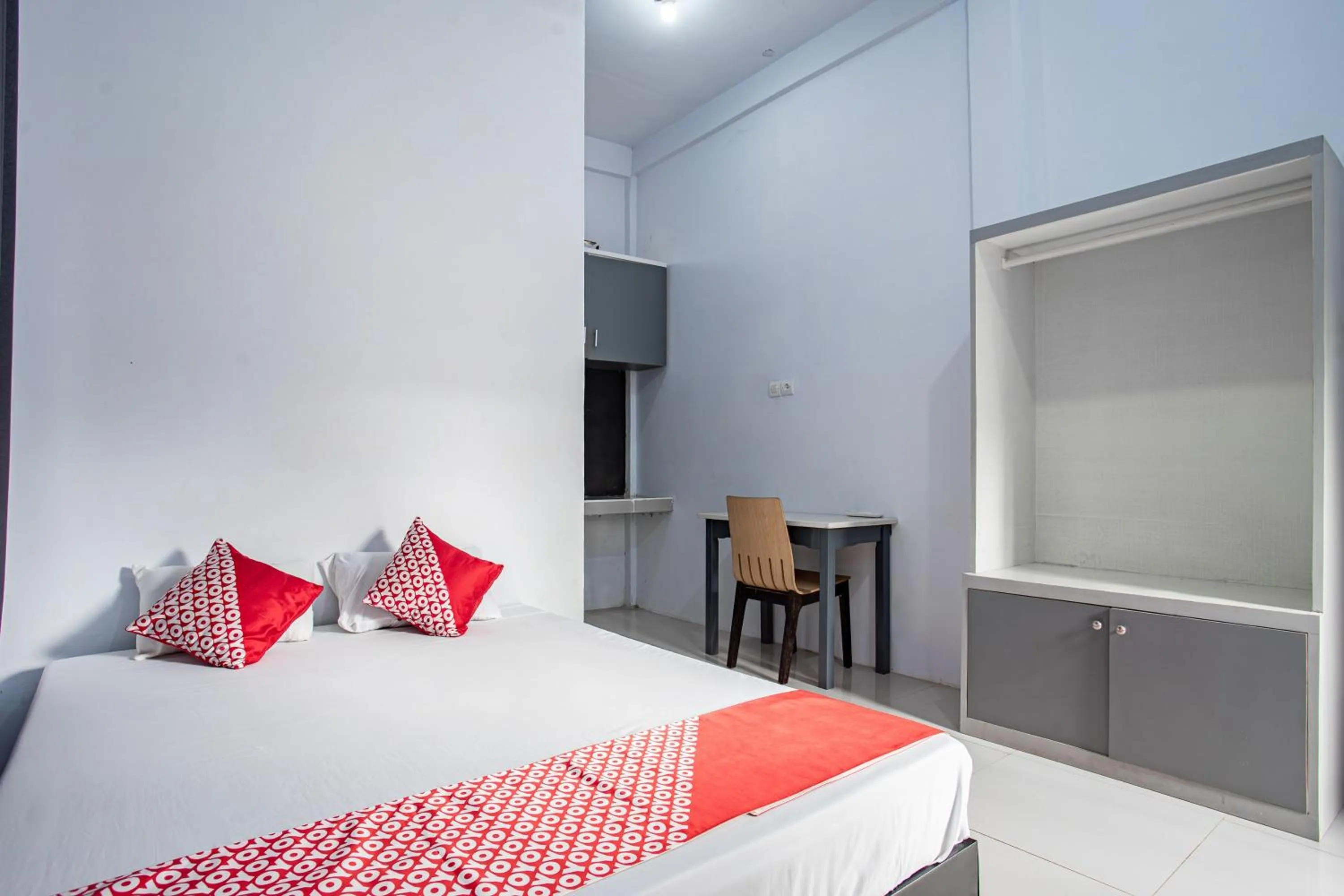 Bedroom in Hotel O Owo Guest House Syariah