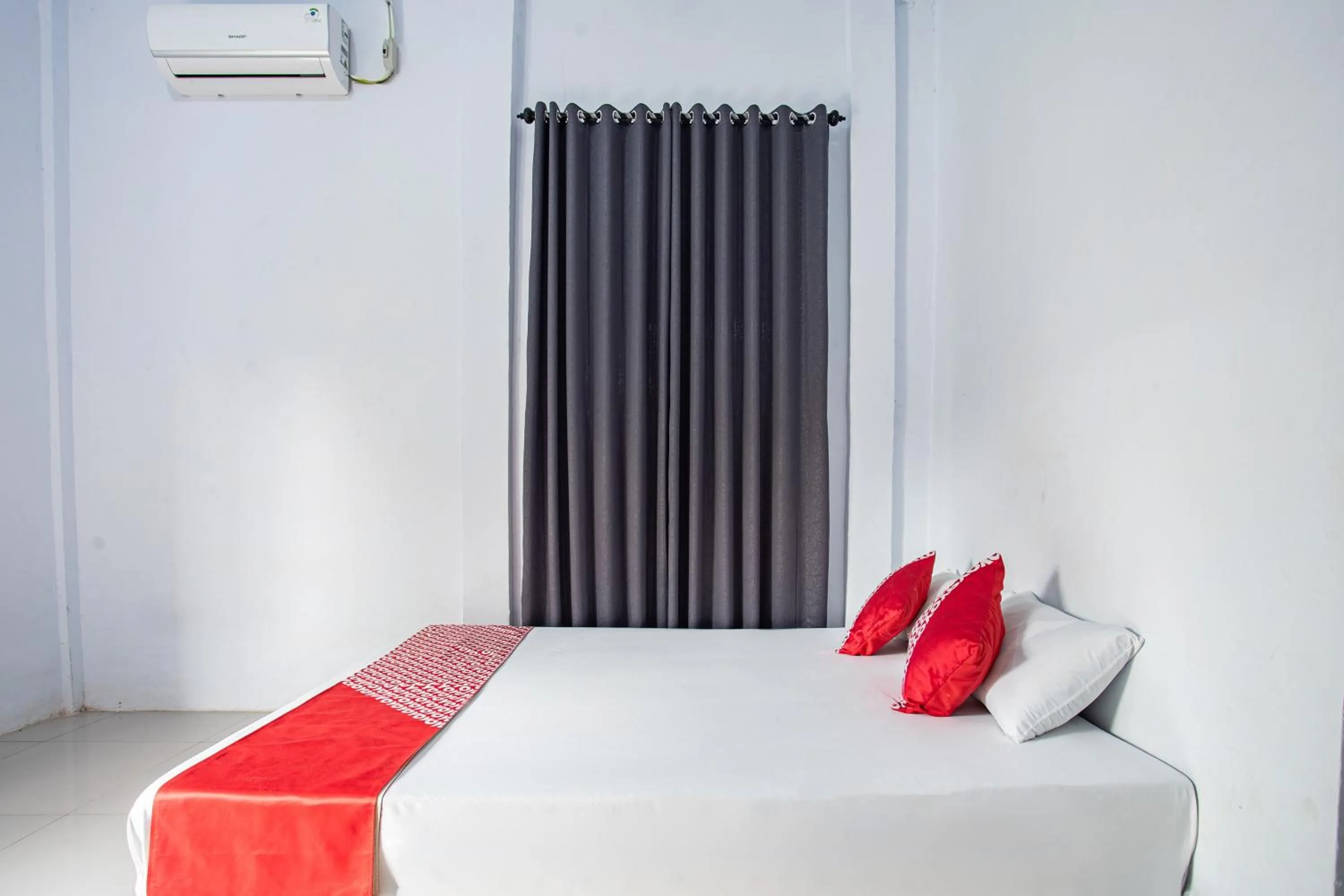 Bedroom in Hotel O Owo Guest House Syariah