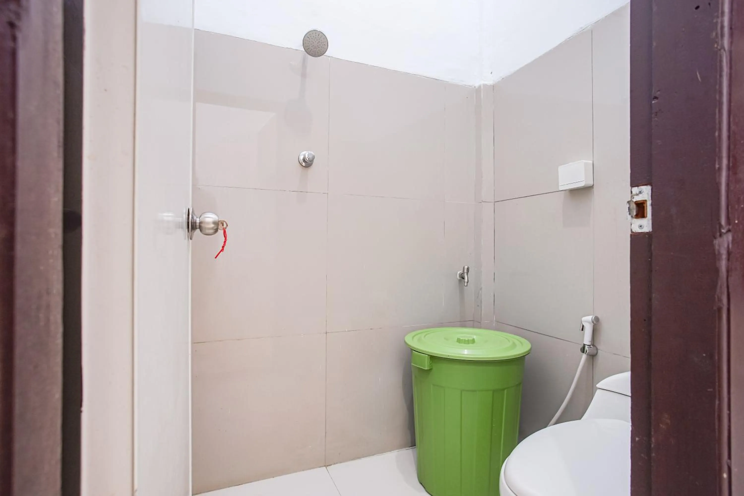 Bathroom in Hotel O Owo Guest House Syariah