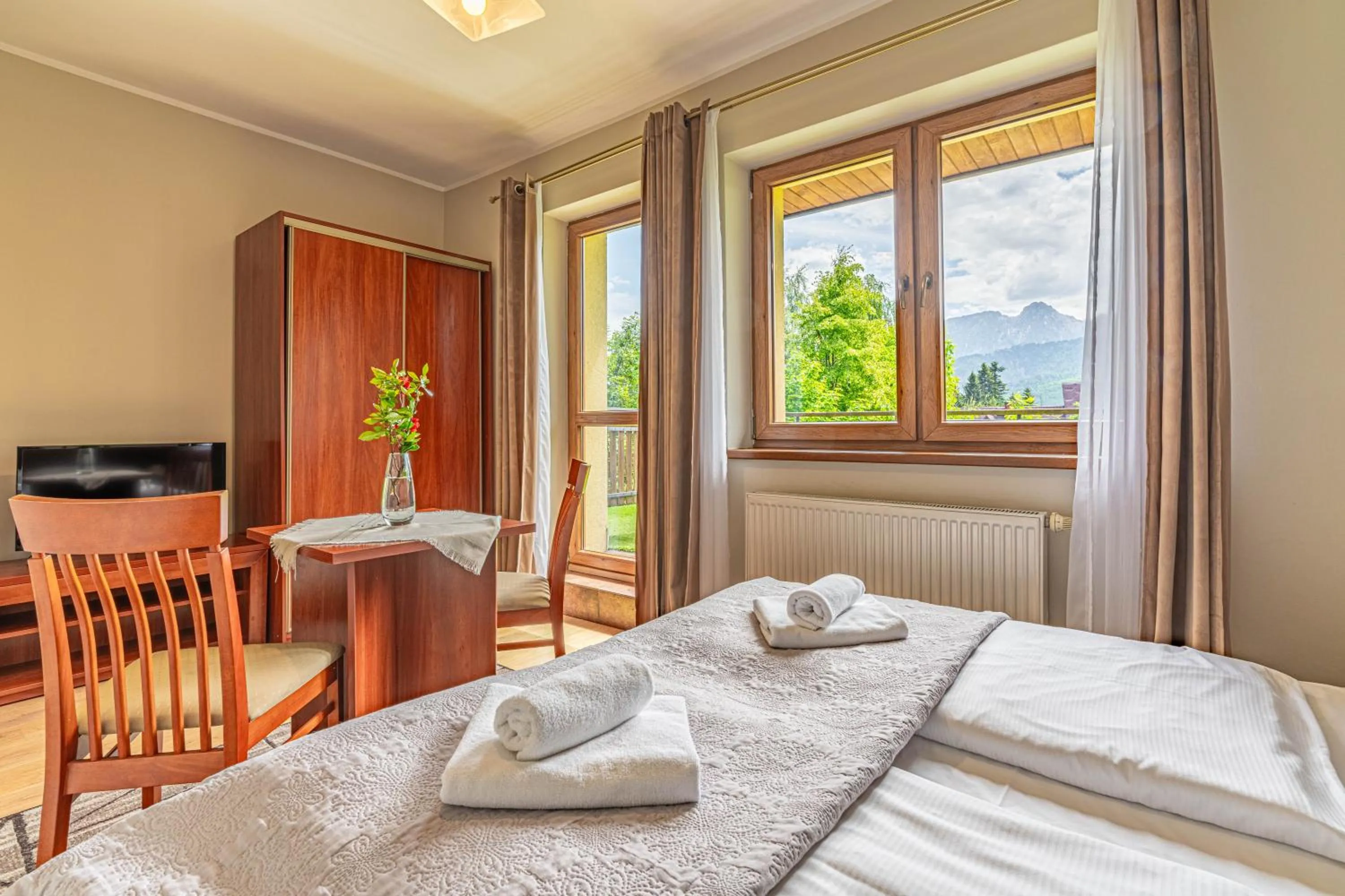 Bed in Willa Serafin-basen, sauny i jacuzzi w Willa Baciarka dodatkowo płatne