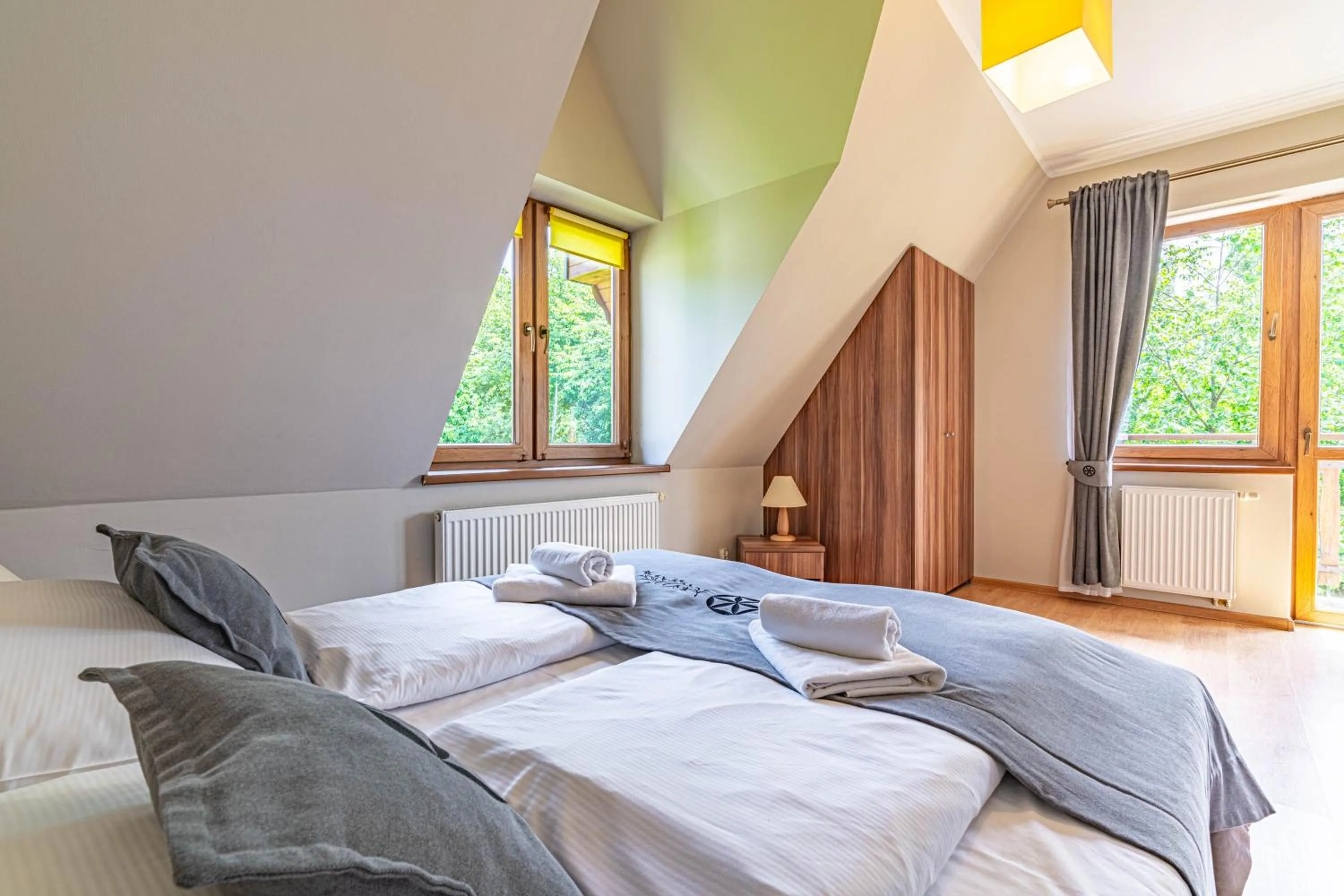 Bed in Willa Serafin-basen, sauny i jacuzzi w Willa Baciarka dodatkowo płatne