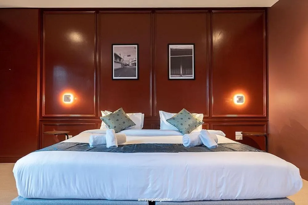 Bed in Pattanipirom Boutique Hotel