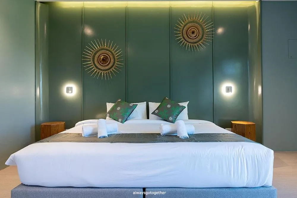 Bed in Pattanipirom Boutique Hotel