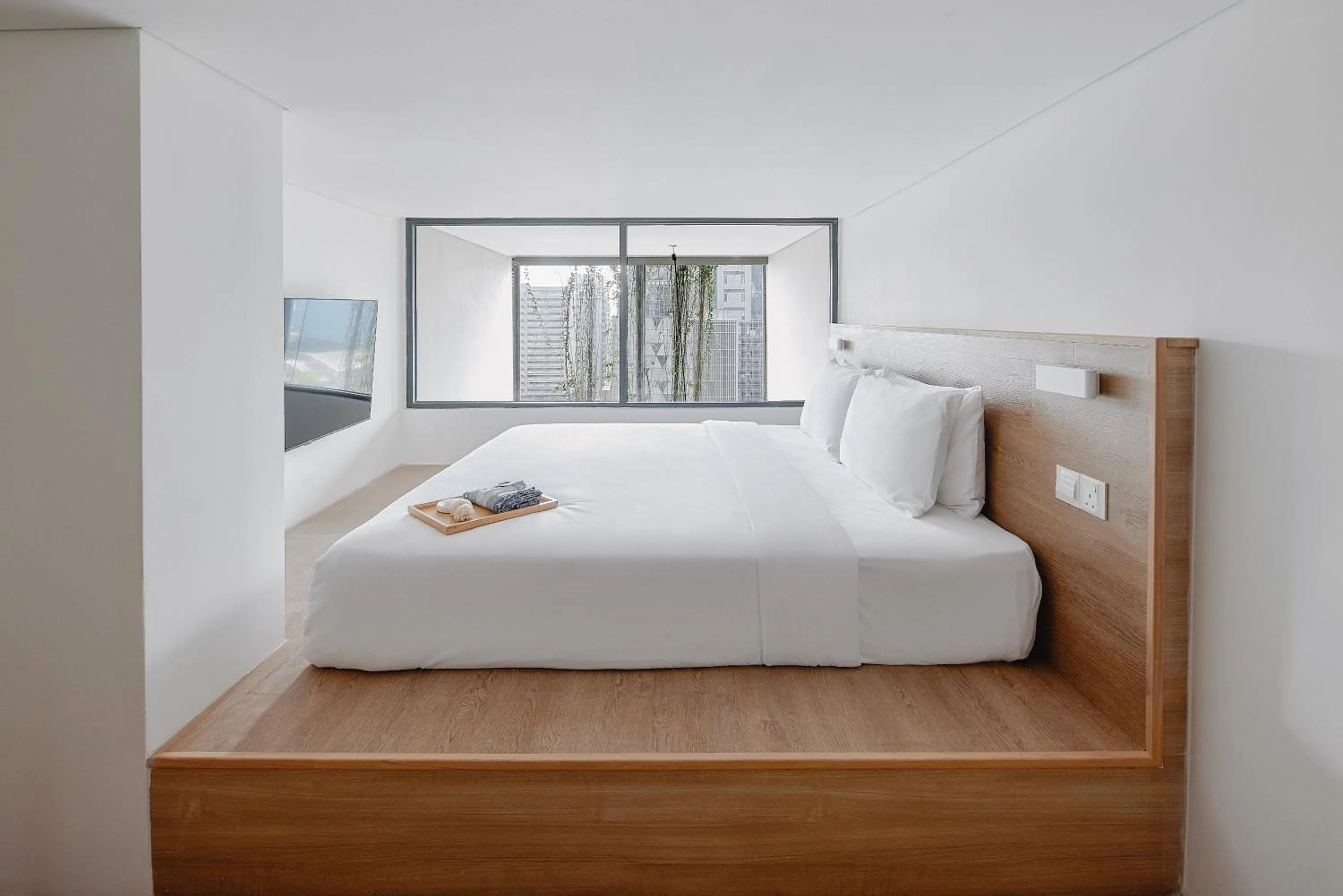 Bed in Lloyd's Inn Kuala Lumpur