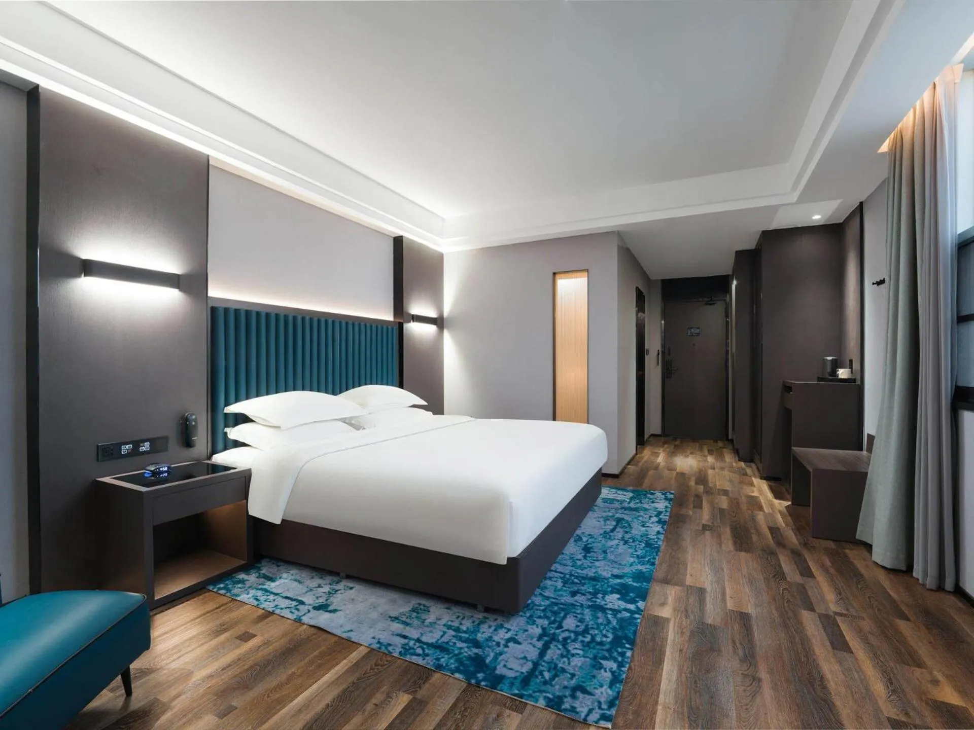 Bed in Park Inn by Radisson Hanzhong Central Square & High speed rail station