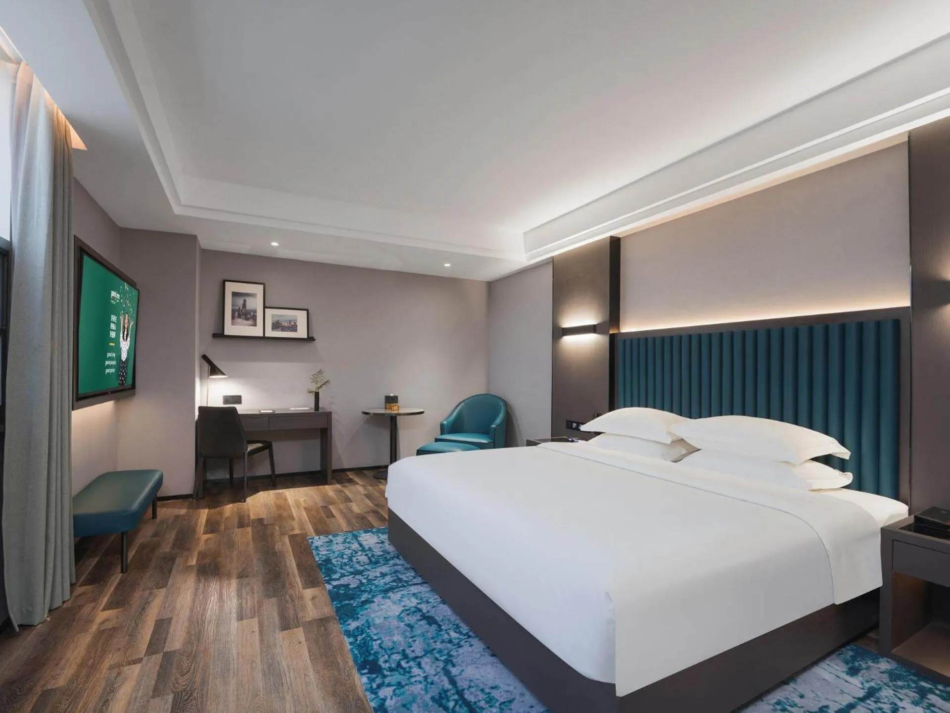 Bed in Park Inn by Radisson Hanzhong Central Square & High speed rail station