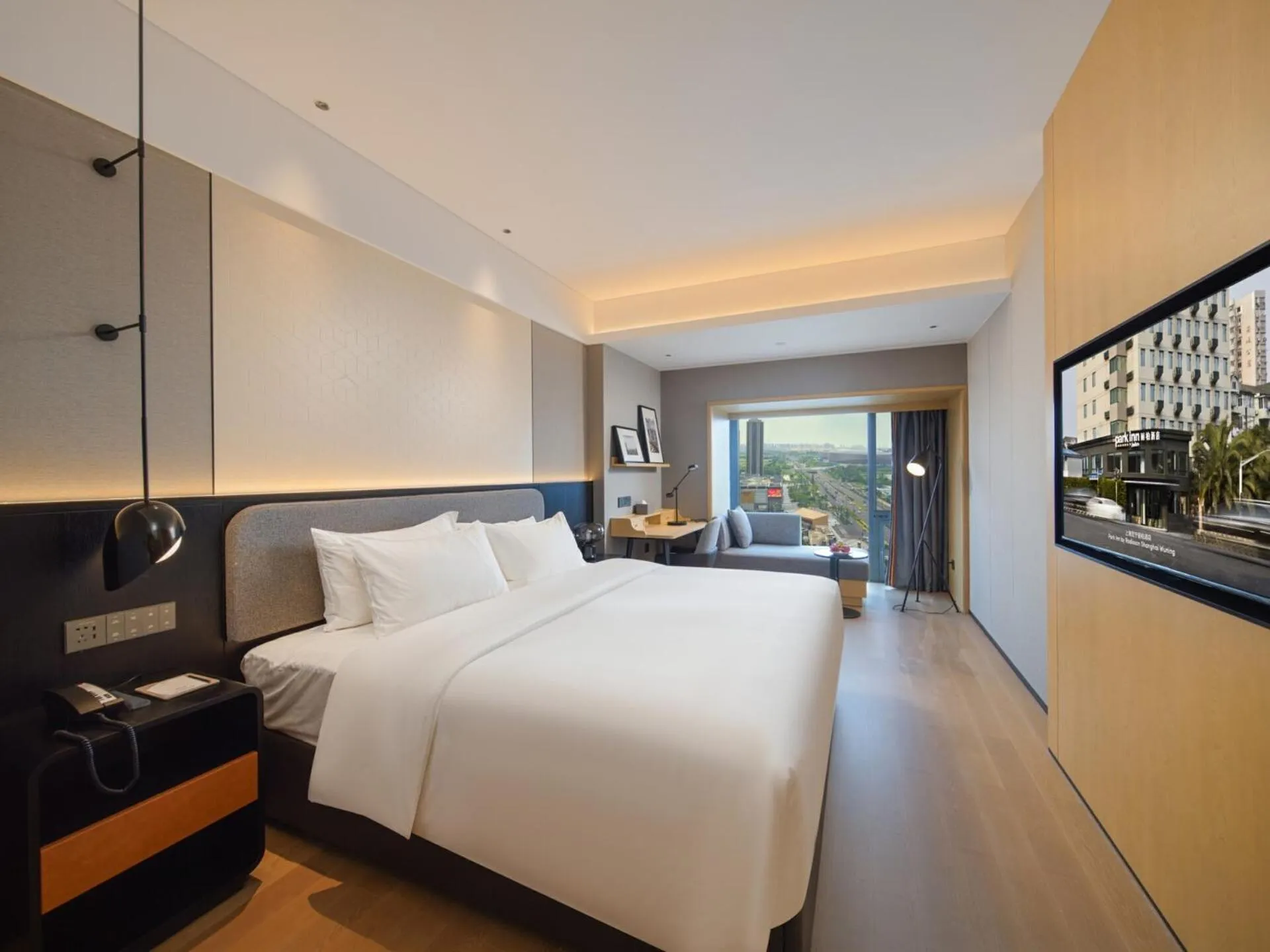 Bed in Park Inn by Radisson Chengdu FengHuang Mountain Sports Park