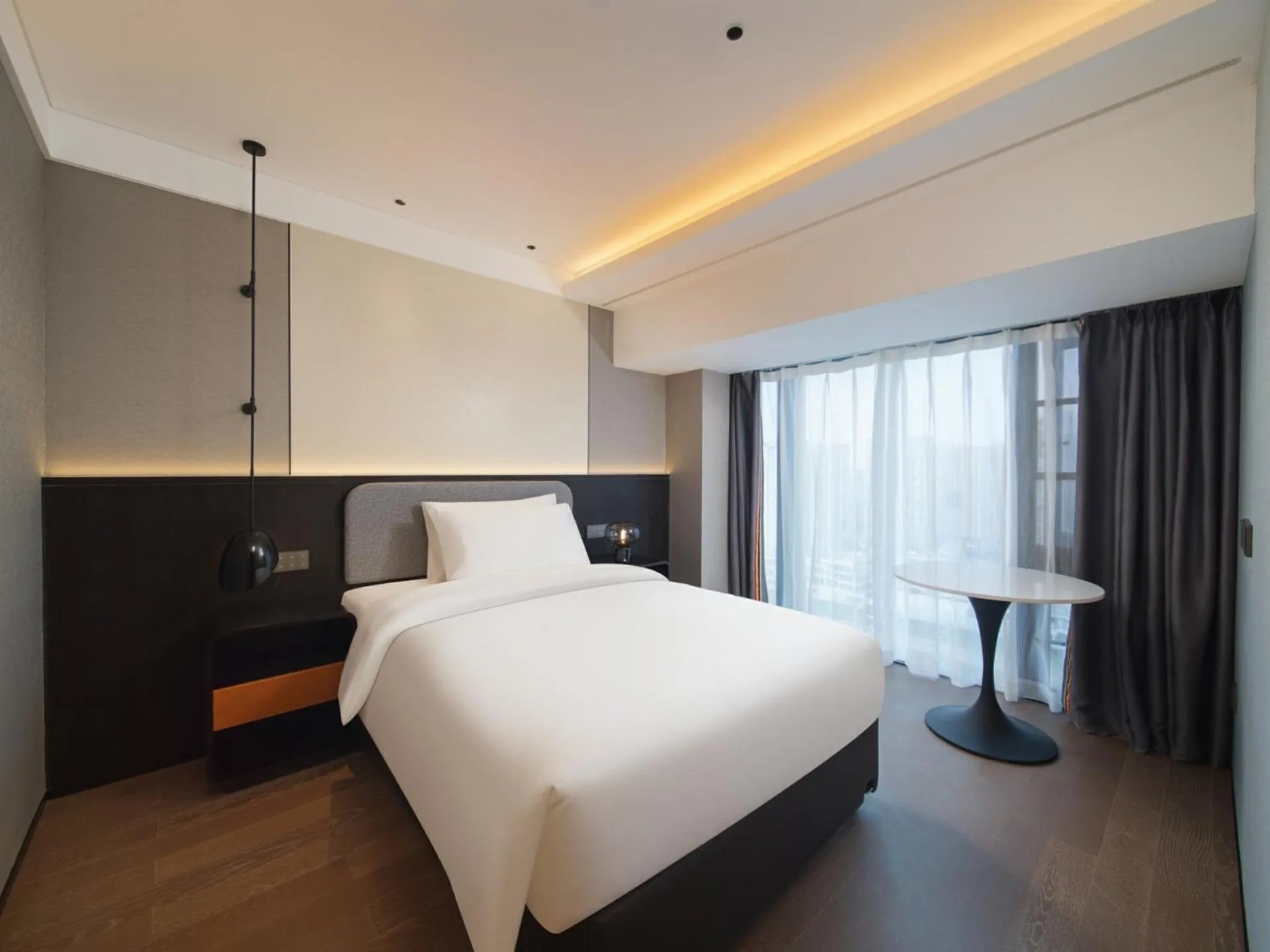 Bed in Park Inn by Radisson Chengdu FengHuang Mountain Sports Park